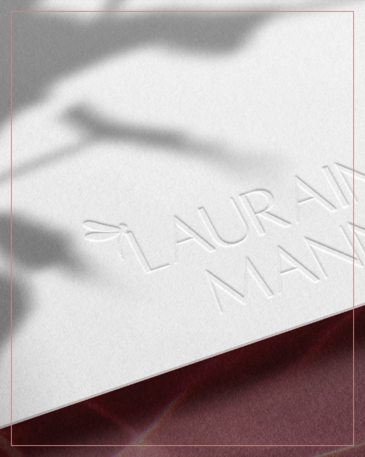 Embossed Lauraine Mann business card