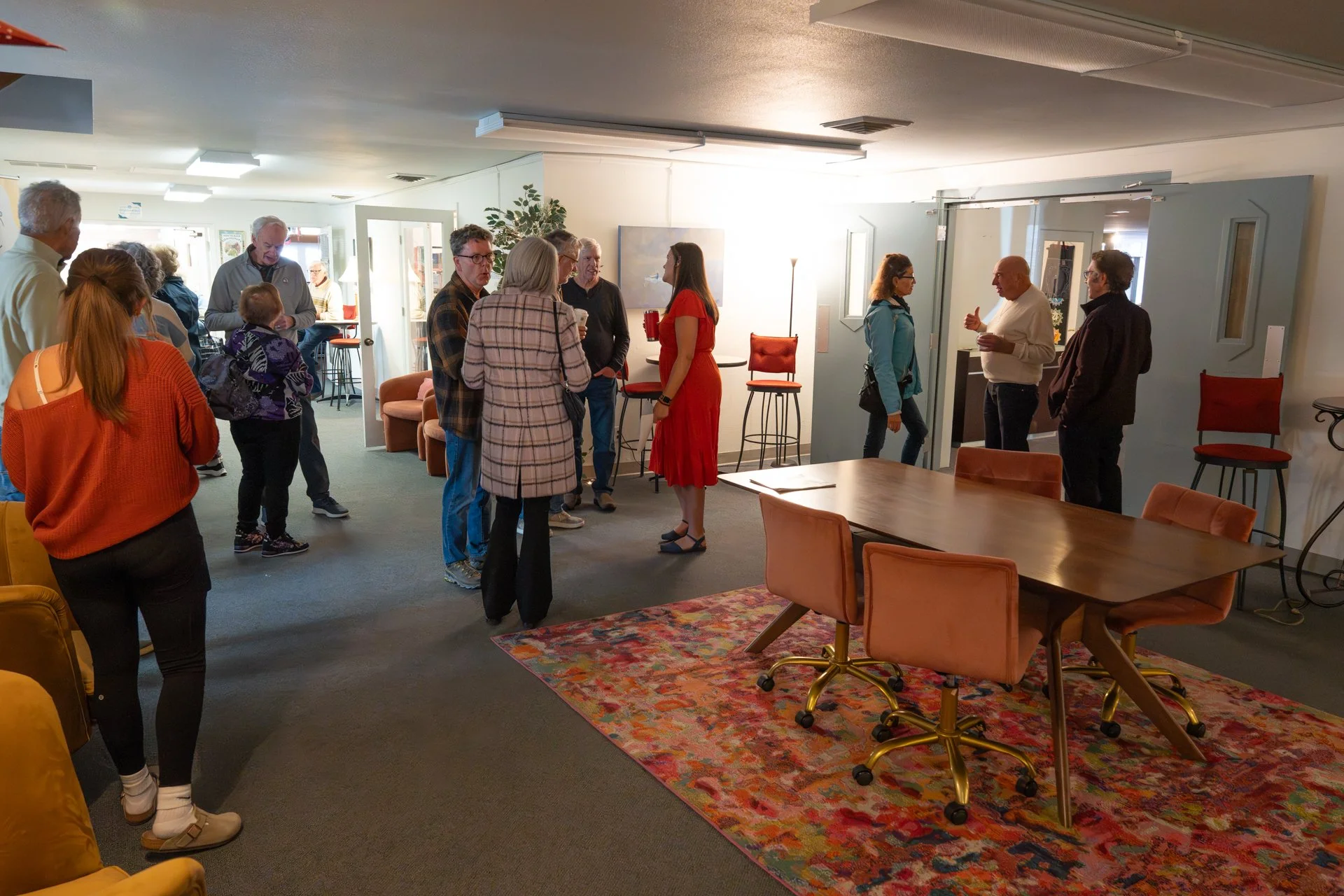 Community of all ages socializing in the lobby