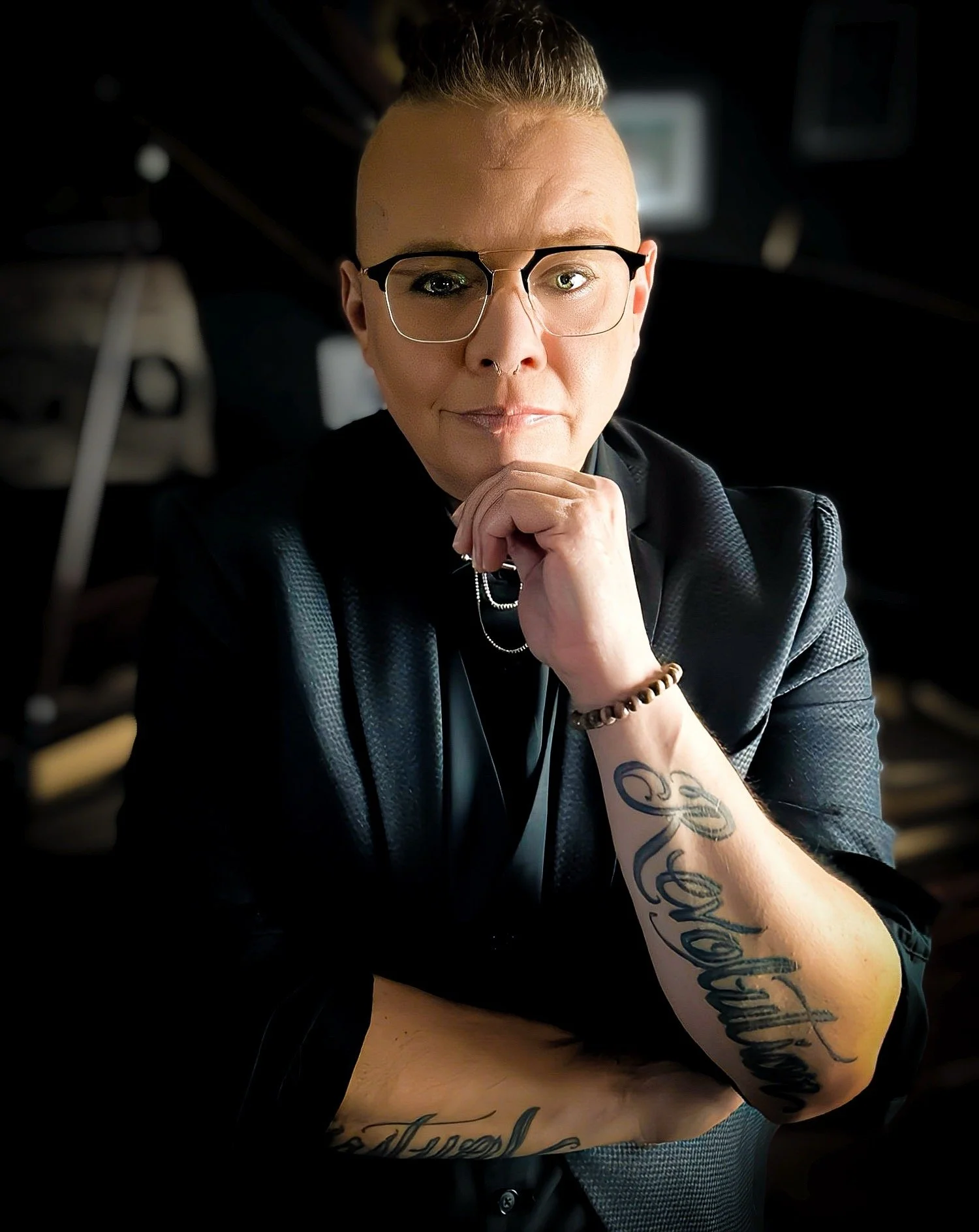 Music Director Summer with her hand on her chin