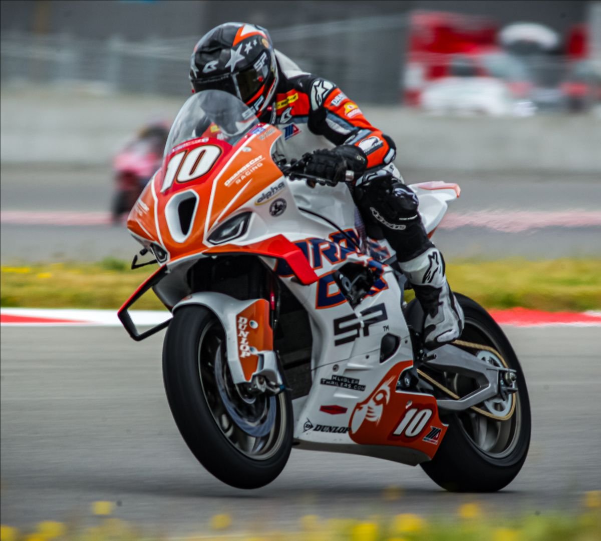 OrangeCat Racing rider Travis Wyman (No. 10) at the Ridge