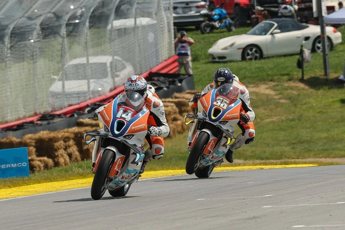 Andrew Lee and Jayson Uribe racing at Mid-Ohio