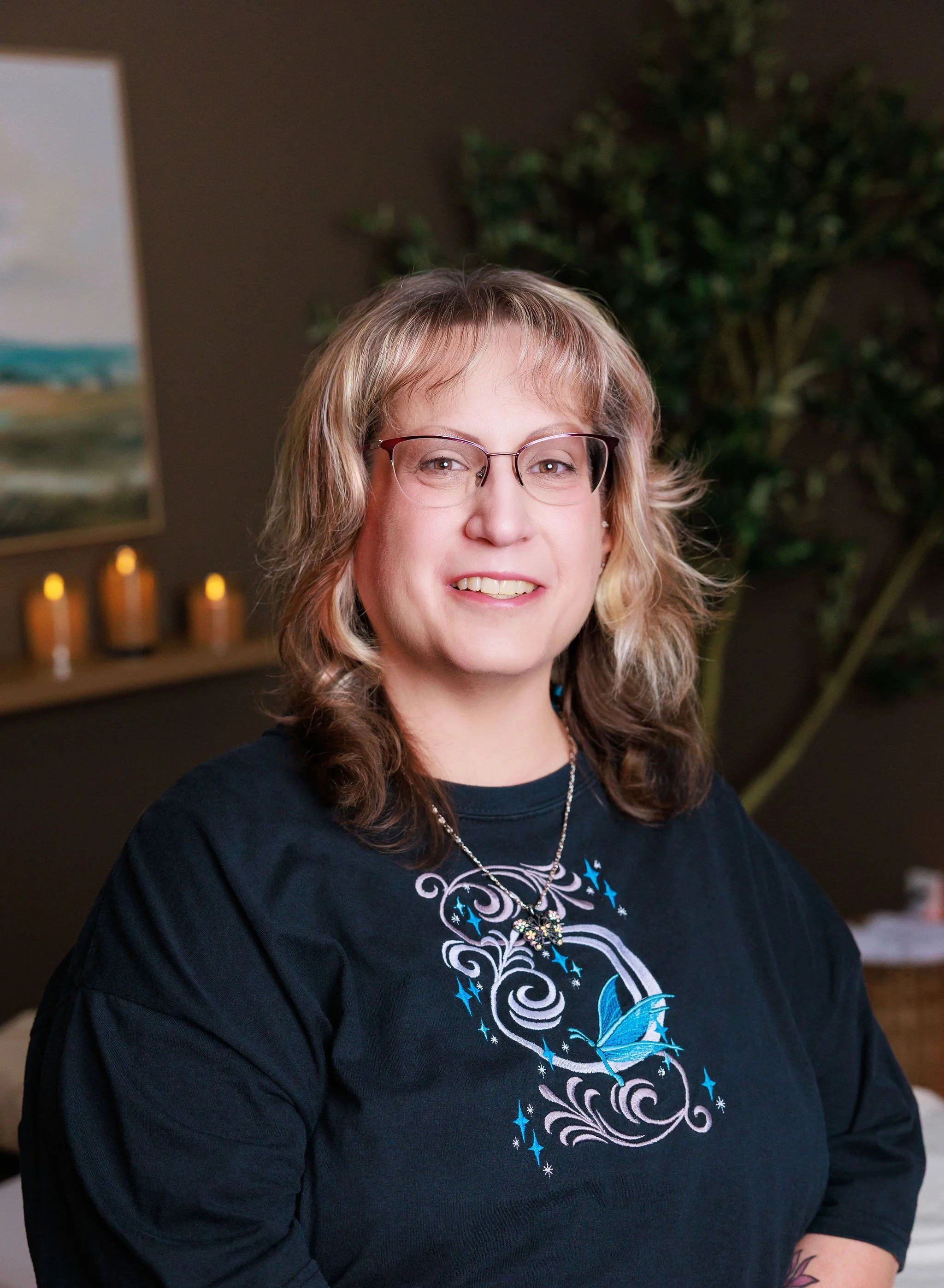 Headshot of Stephanie Williams Reiki Master at Held Space Wellness in Boone, Iowa