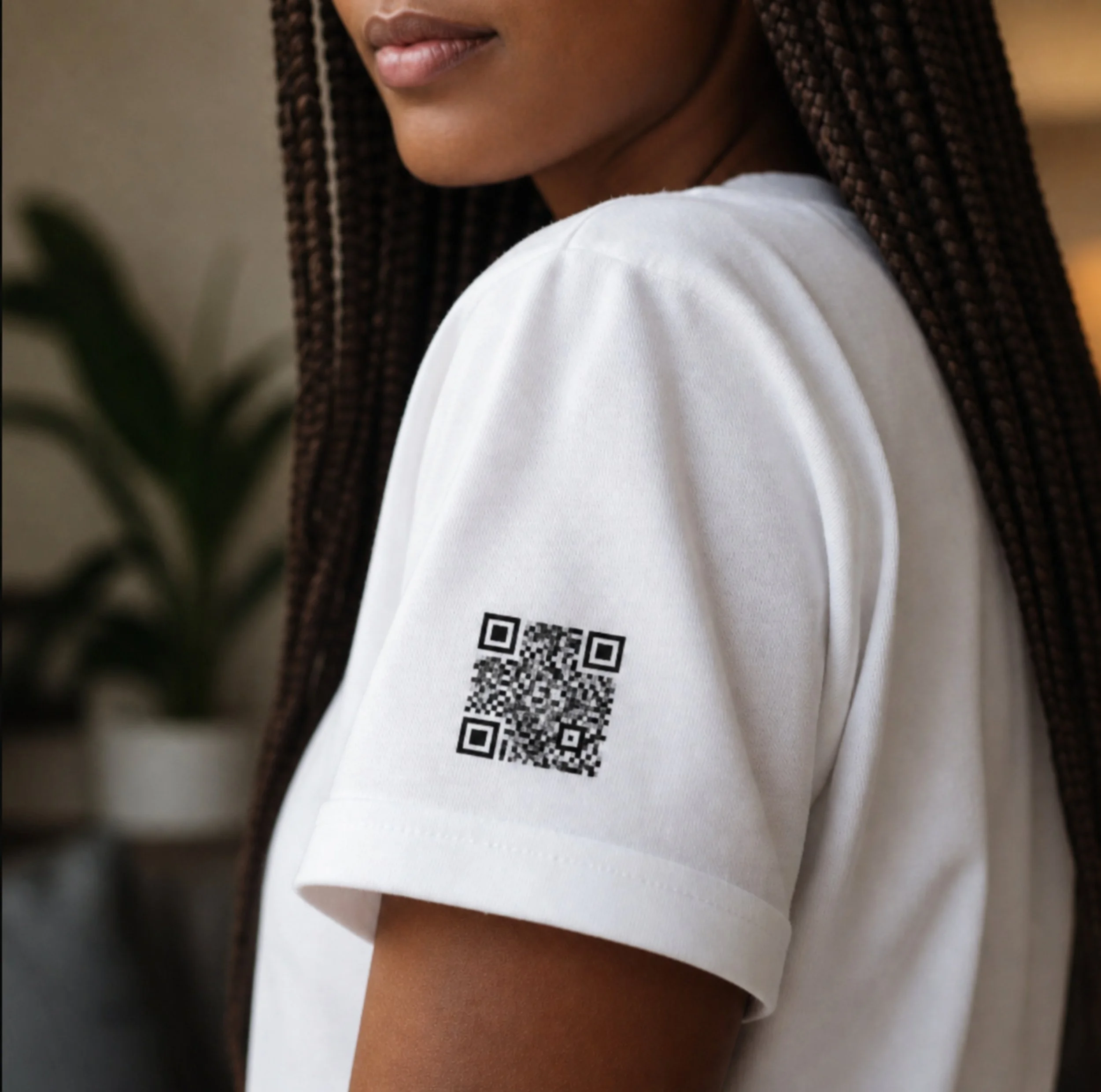 Jasmine's Client Wearing a White Tee Featuring a QR Code - Affirmation Apparel by Sawubona Life