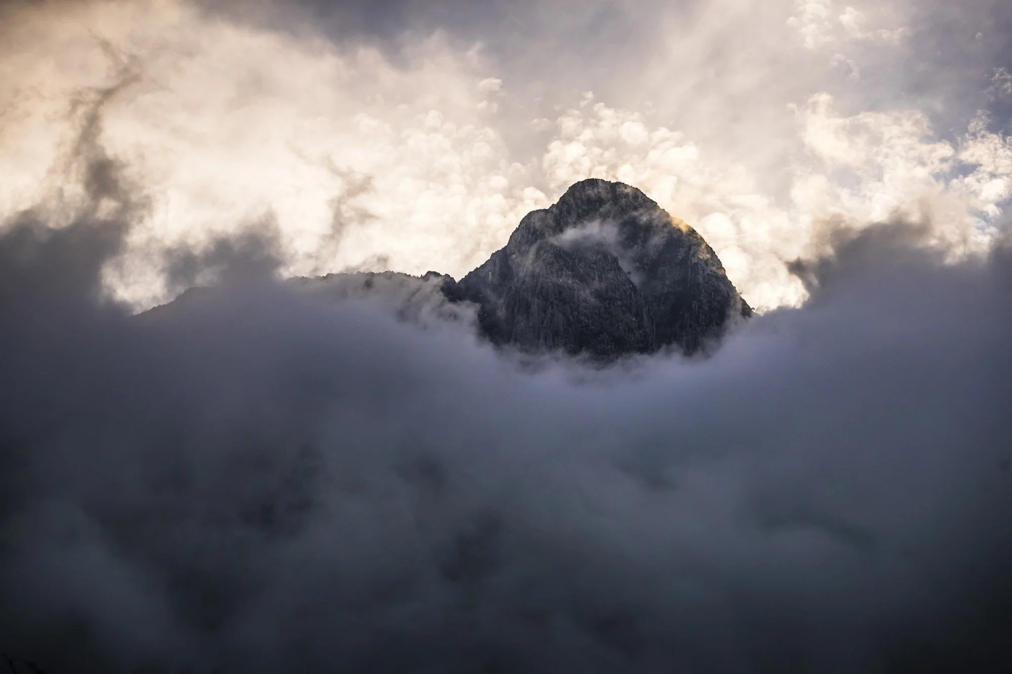Moody mountain sunrise with clouds at El Potrero Chico during an outdoor brand production assignment.
