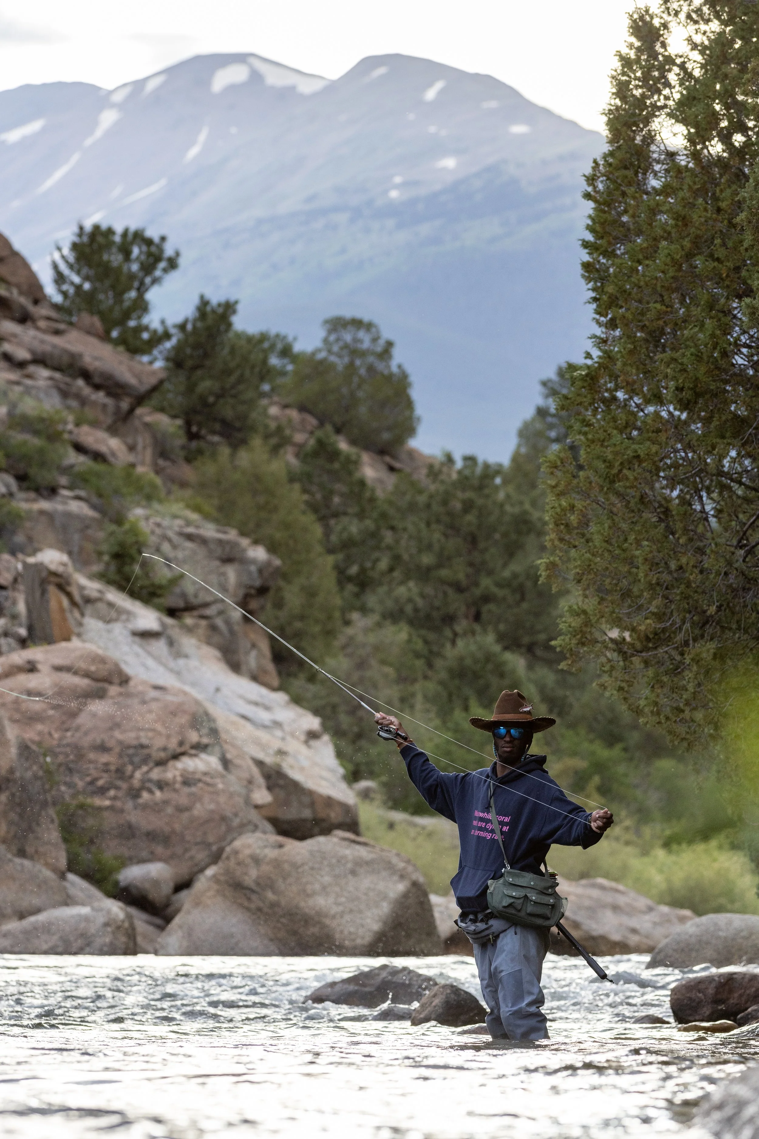 Eeland Stribling fly fishing in a river near Salida, Colorado during the Protect Our Winters Punchline film, produced by Fieldborn Creative.