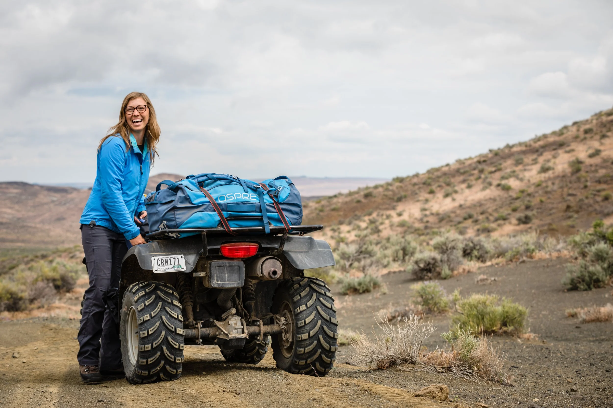 Portrait of Caitlin Davis loading her quad during filming of the Golden project, photographed by Fieldborn Creative.