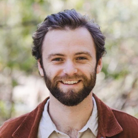 Headshot of Cole Euell, Creative Manager at Klean Kanteen, featured in a testimonial for Fieldborn Creative.