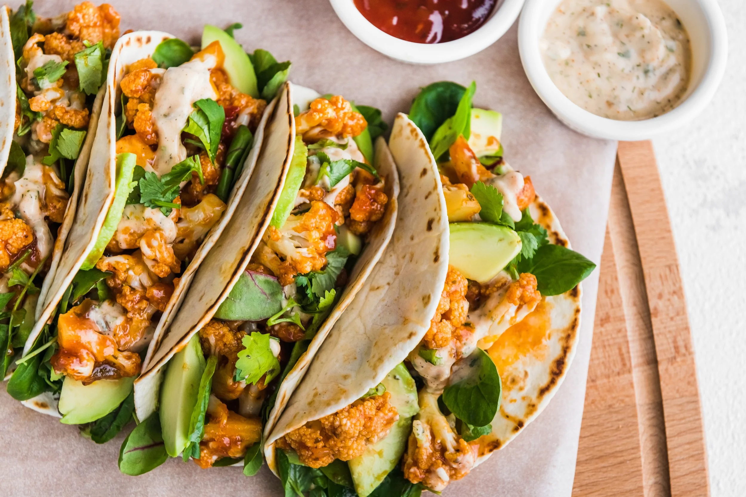 Roasted Cauliflower Tacos with Avocado Lime Sauce