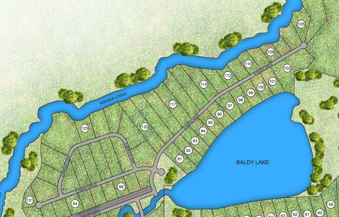 Map of a residential area near Baldy Lake with numbered lots, roads, Answer Creek, and trees.
