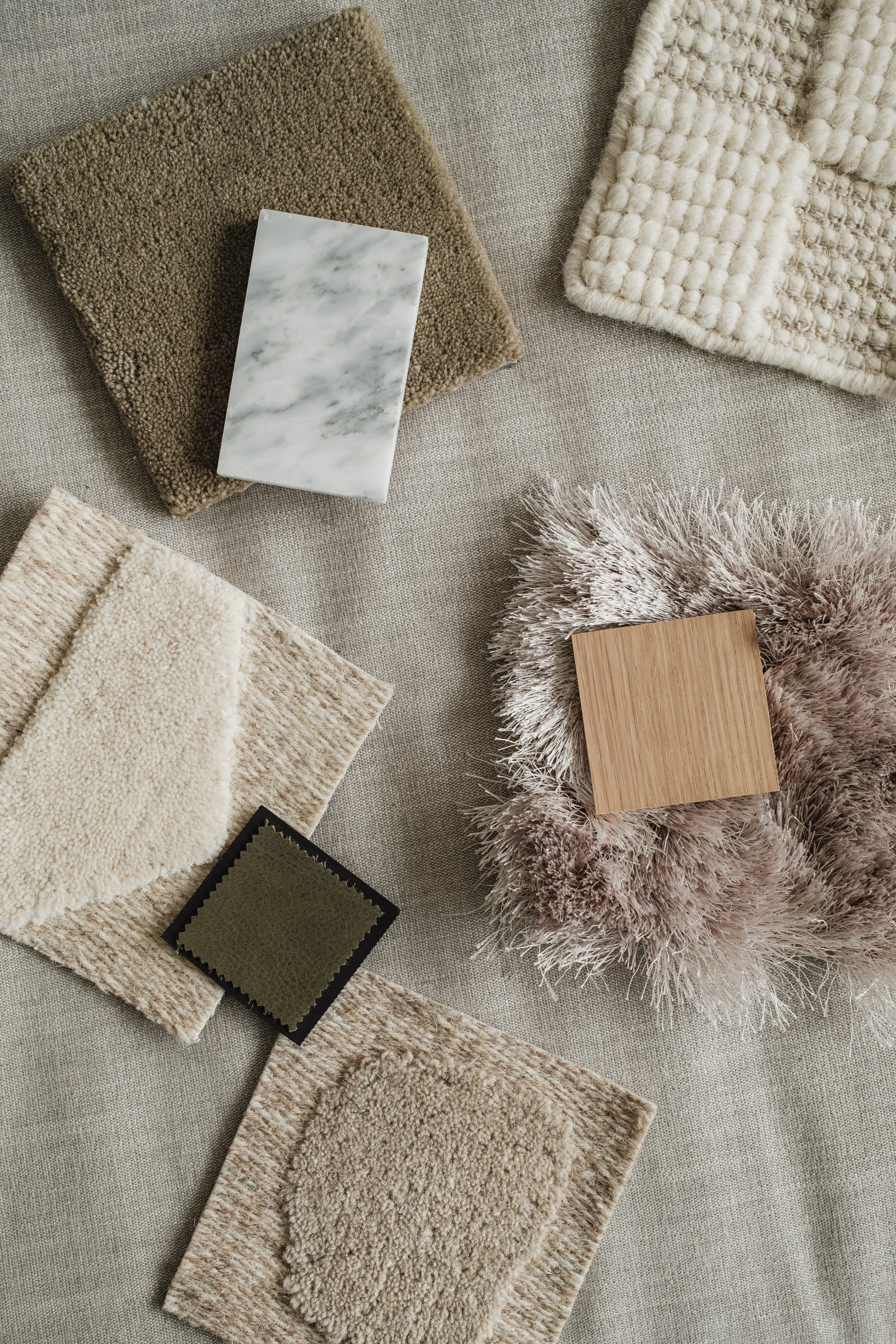 kaboompics_interior-design-material-board-home-styling-a-neutral-color-scheme-fabric-samples-35110.jpg