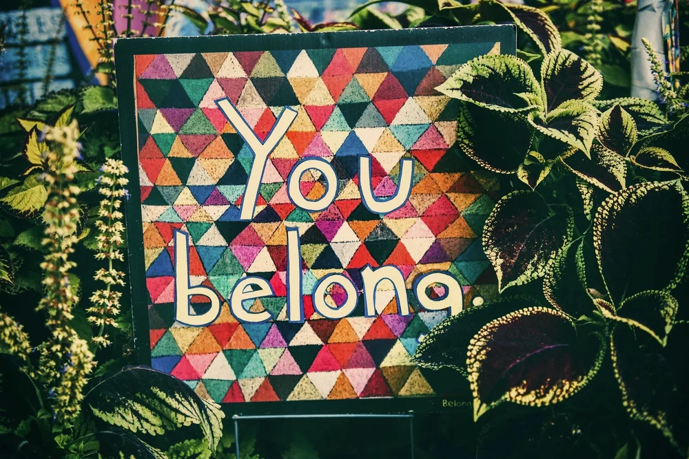A colorful sign reading You belong