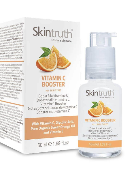 Skintruth Vitamin C Booster serum packaging and bottle with orange slice illustration.