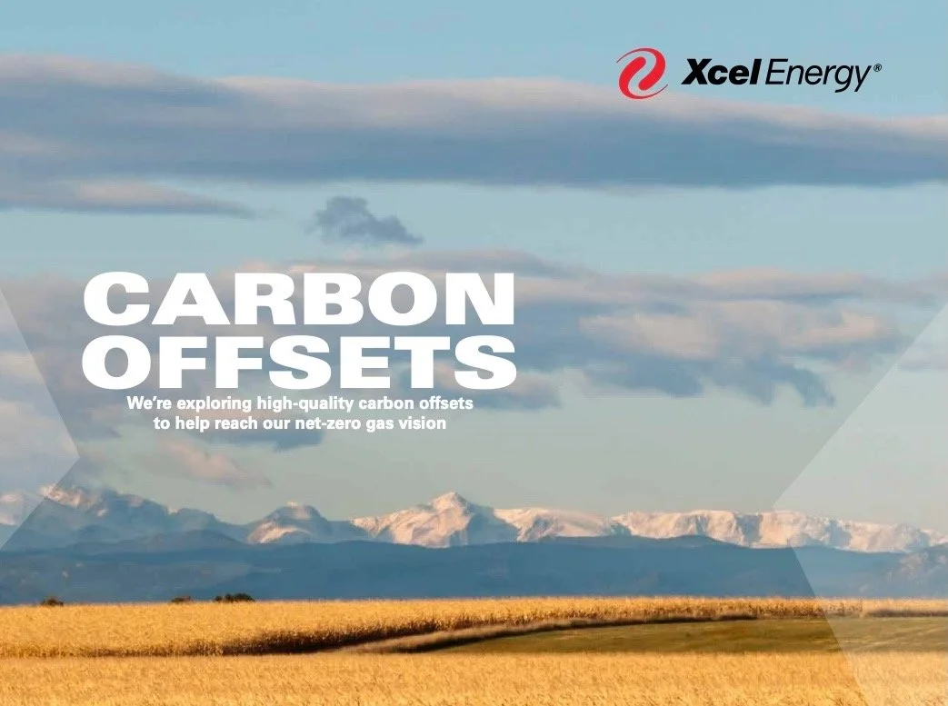 A landscape with yellow fields in the foreground and snow-capped mountains in the background, under a partly cloudy sky. Text overlay about exploring high-quality carbon offsets to reach net-zero gas vision, with a company logo in the top right corner.