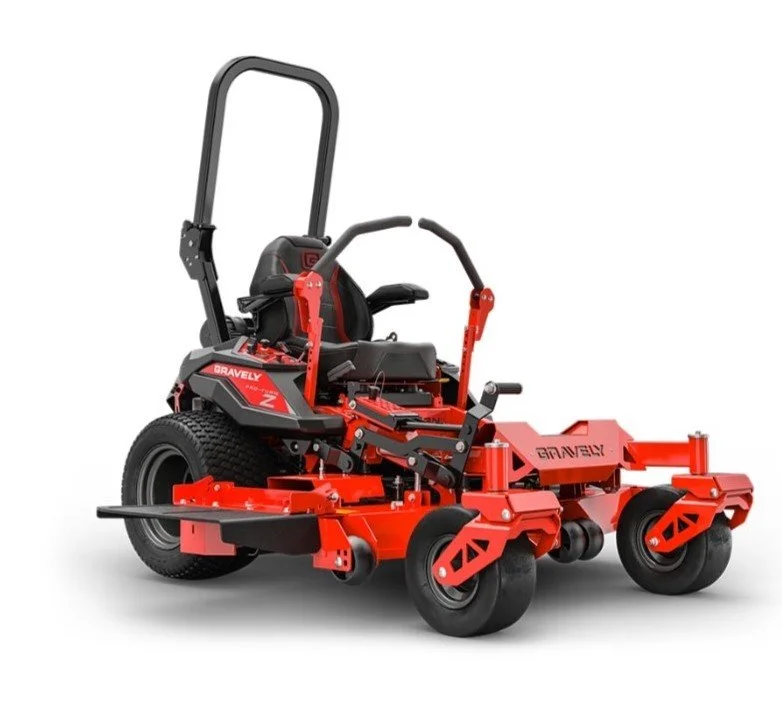 A red Gravely Zero Turn lawn mower with a black seat and handles.