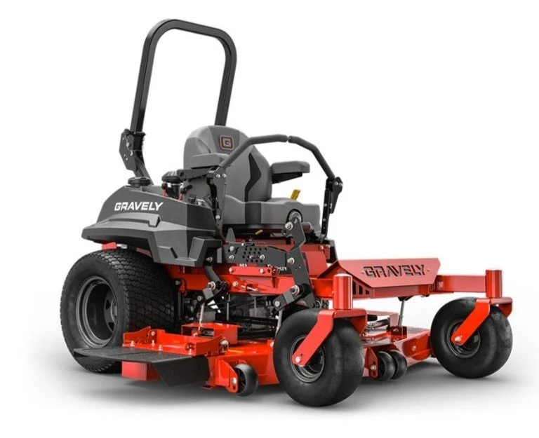 A red and gray commercial riding lawn mower with large rear tires, a black seat, and a steering wheel.