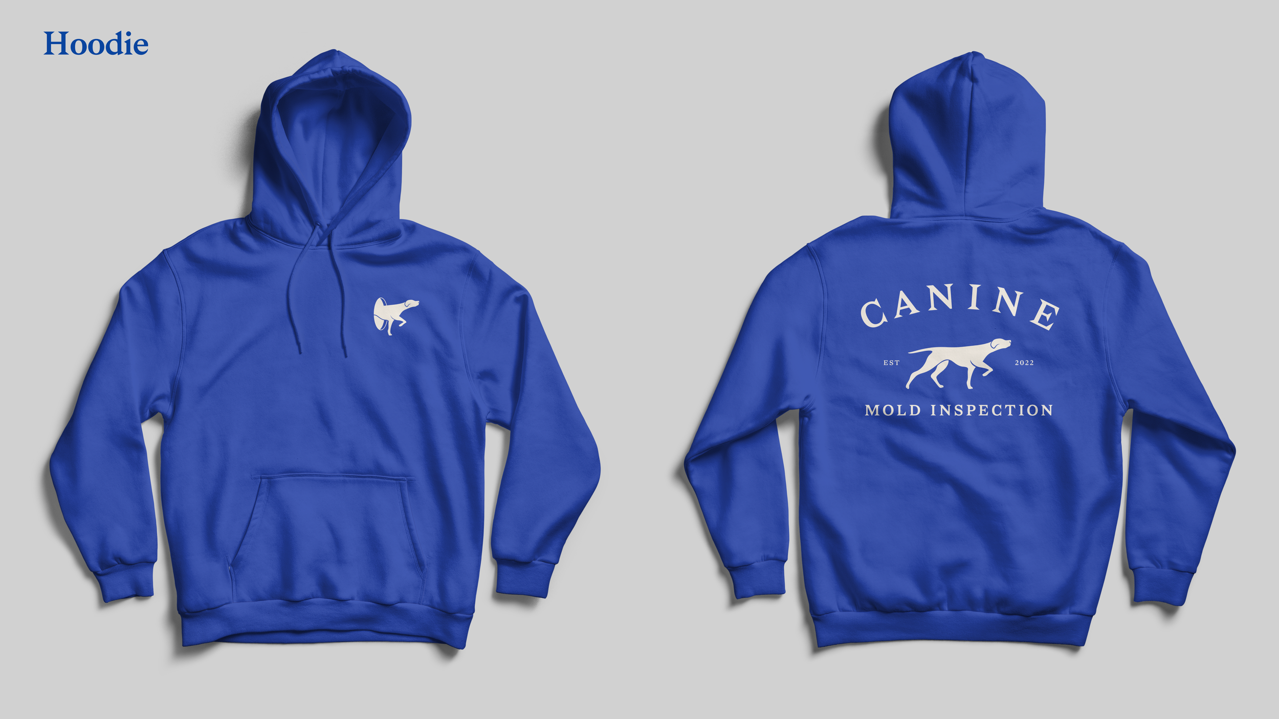 Blue hoodie with a white dog logo on the front and back. The back features the words 'CANINE' and 'MOLD INSPECTION' along with 'EST 2022' and an illustration of a dog in motion.