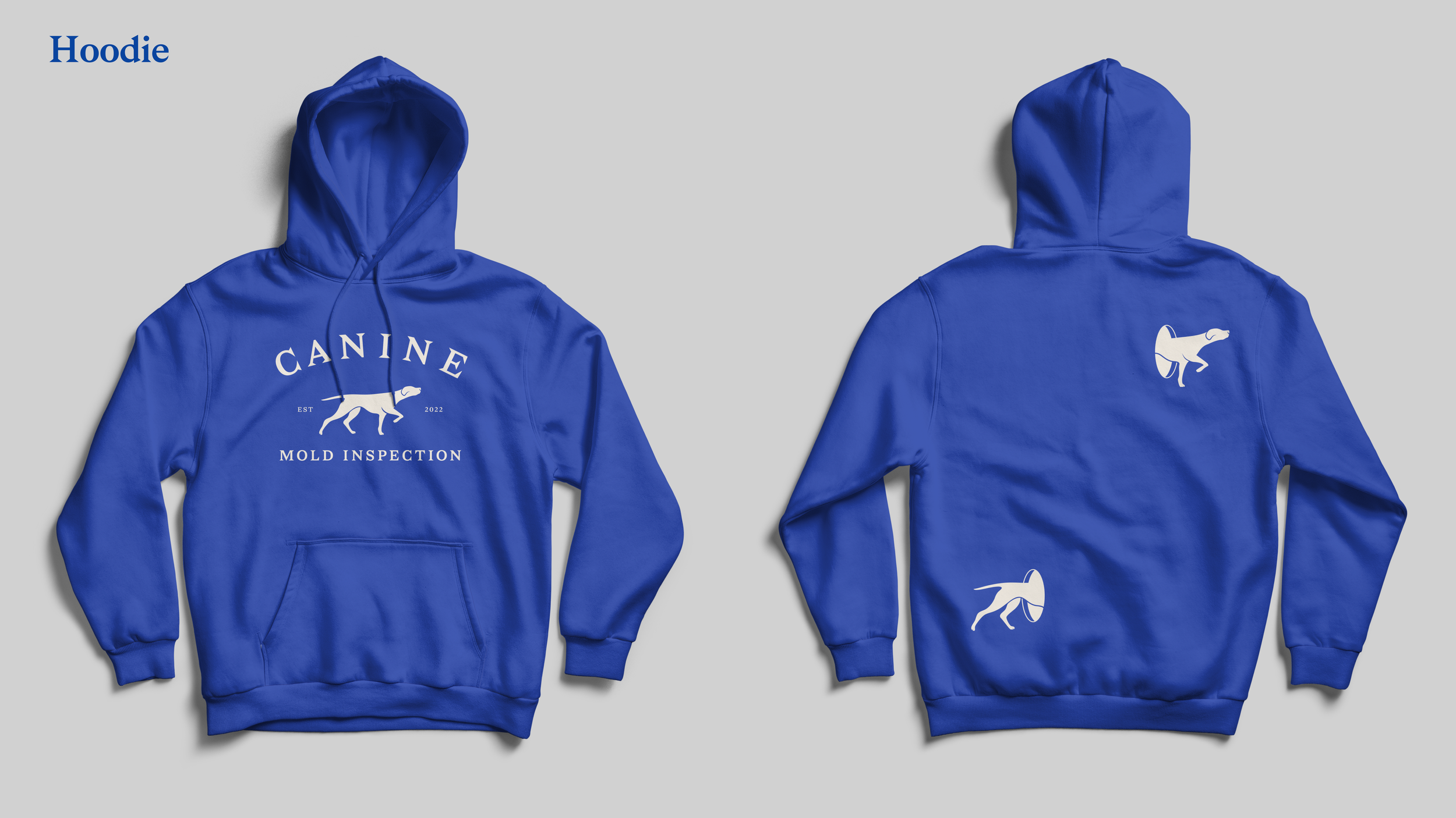 Blue hoodie with a white dog logo on the front reading "CANINE Mold Inspection EST 2022" and a smaller dog logo on the back.