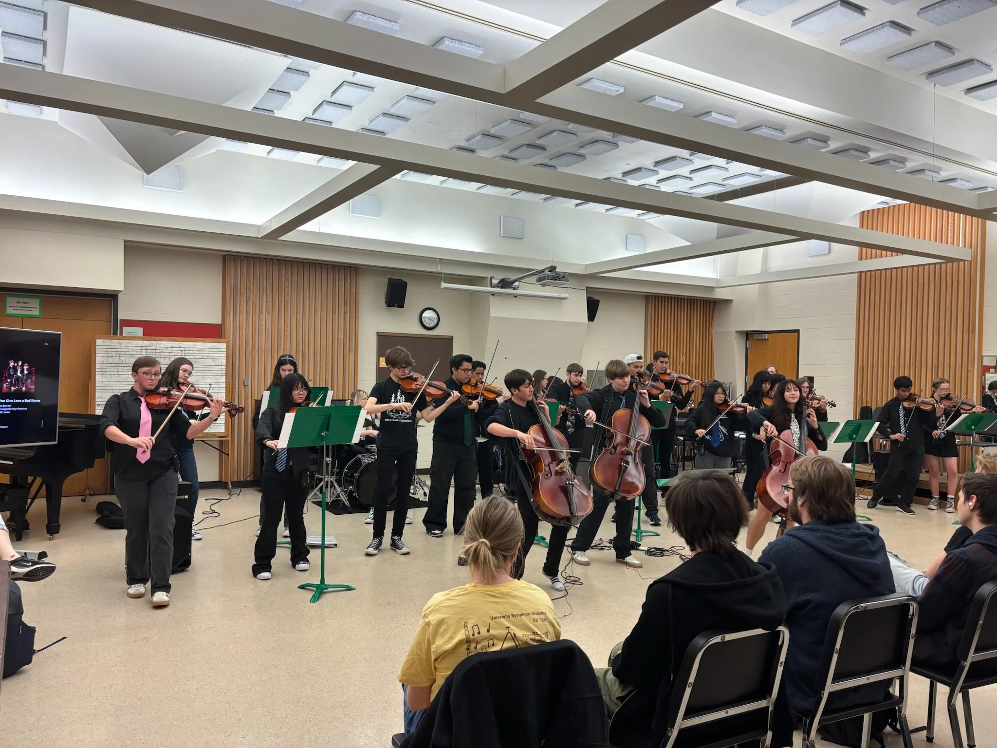 East Kentwood High School’s ABC (Anything But Classical) Orchestra giving a presentation at WMU with college students improvising.