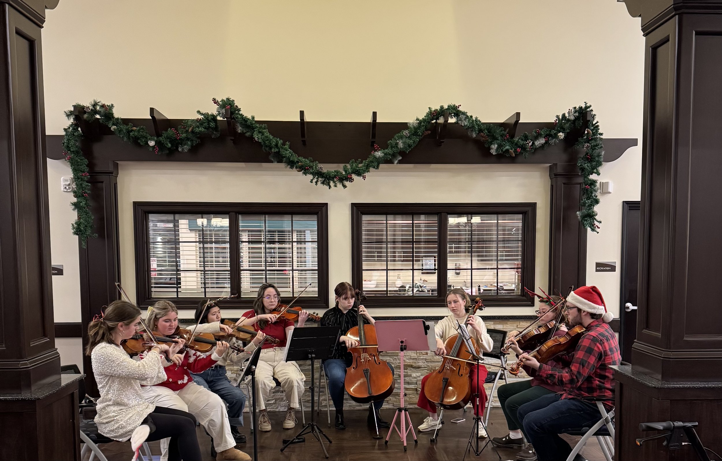 WMU ASTA string octet performing Christmas carols at The Oaks in Byron Center nursing home. I performed on the cello.