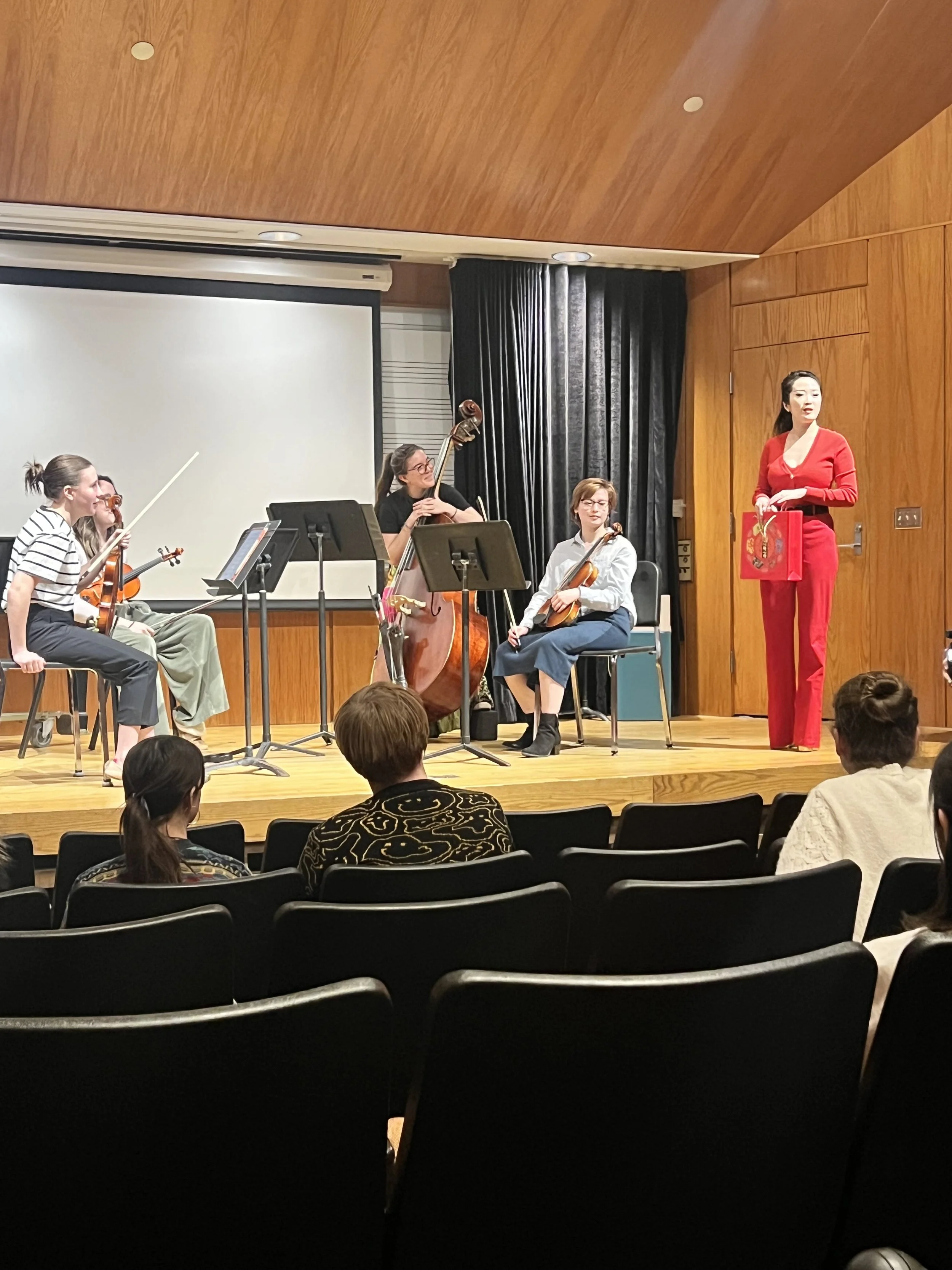 “The Board String Quartet” performing in WMU string area. 