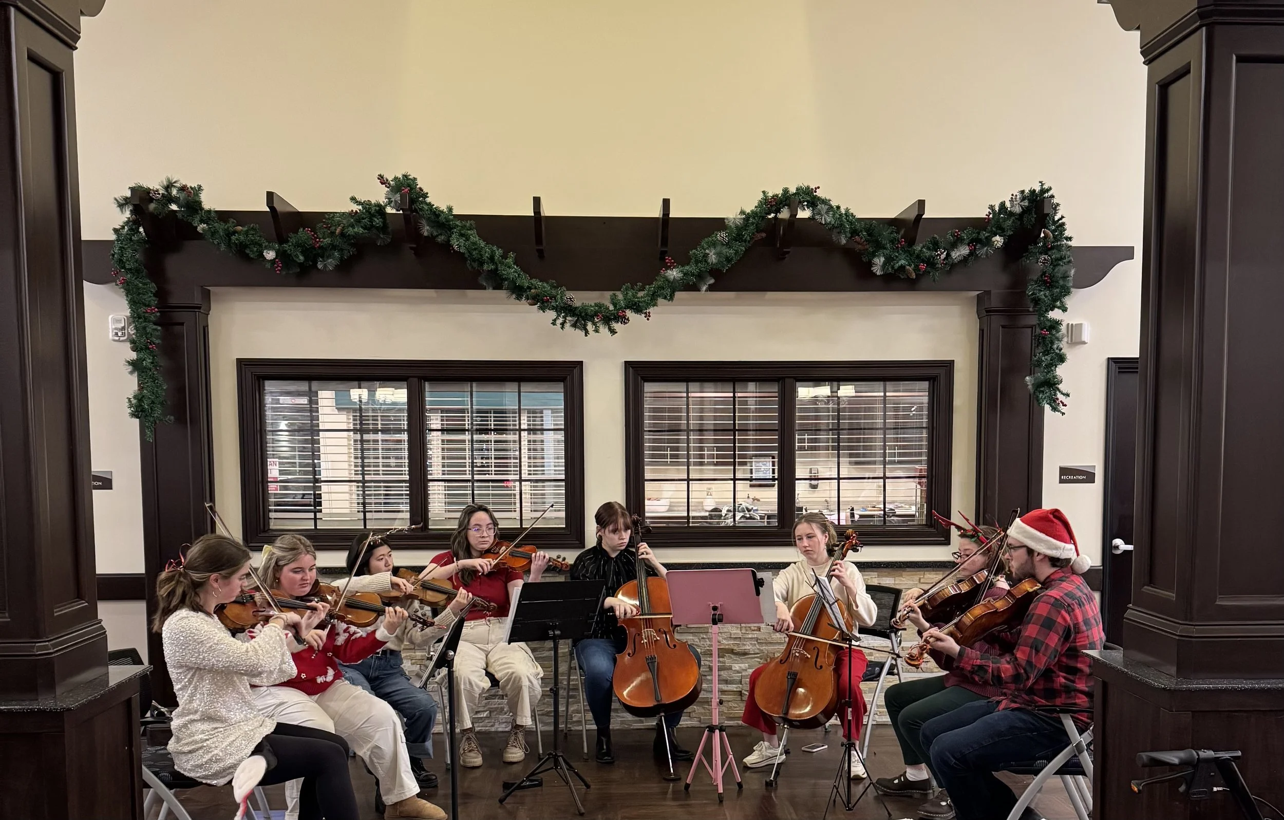 String octet performing Christmas music at The Oaks in Byron Center nursing home.