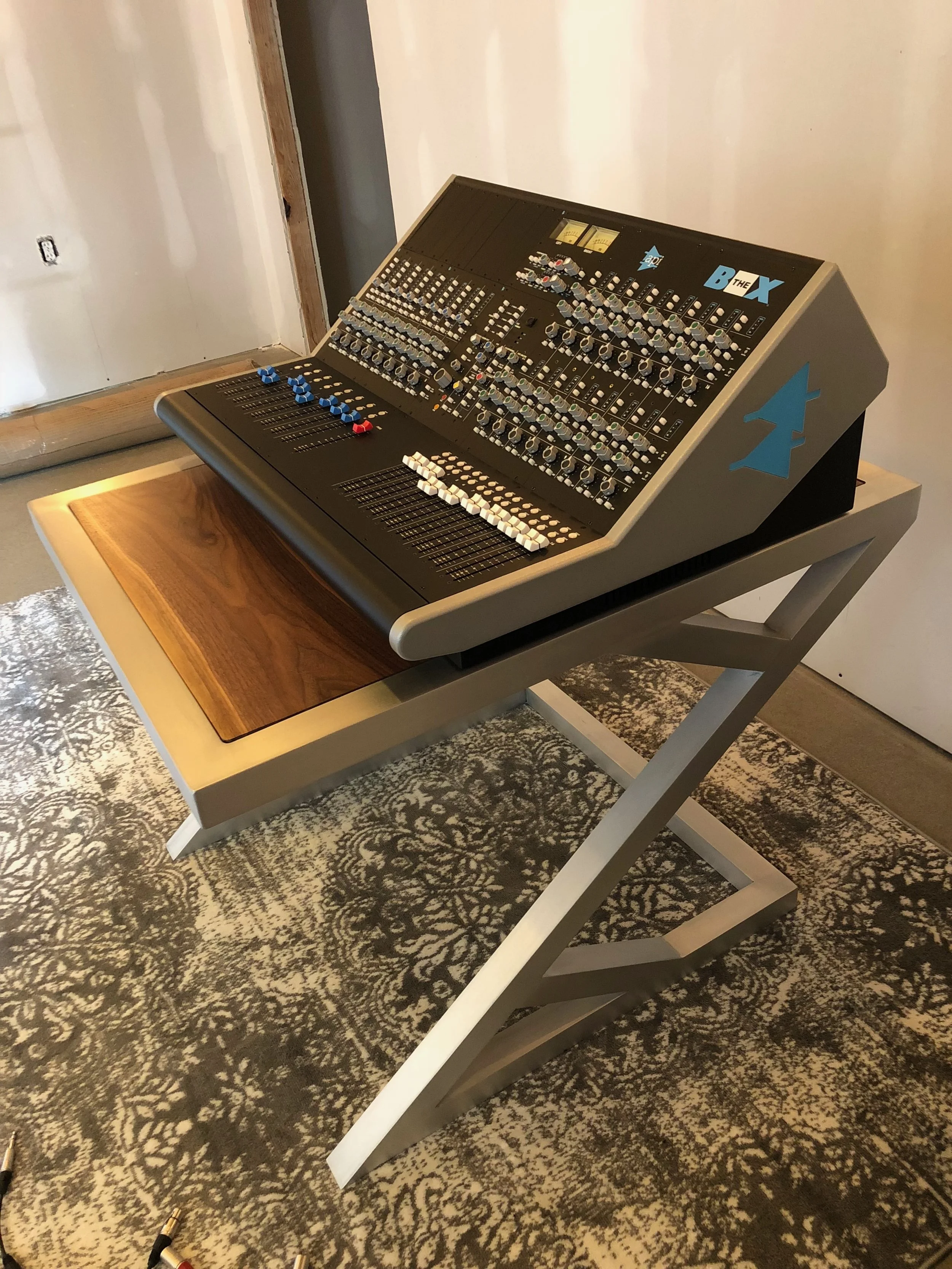 console base, aluminum and wood