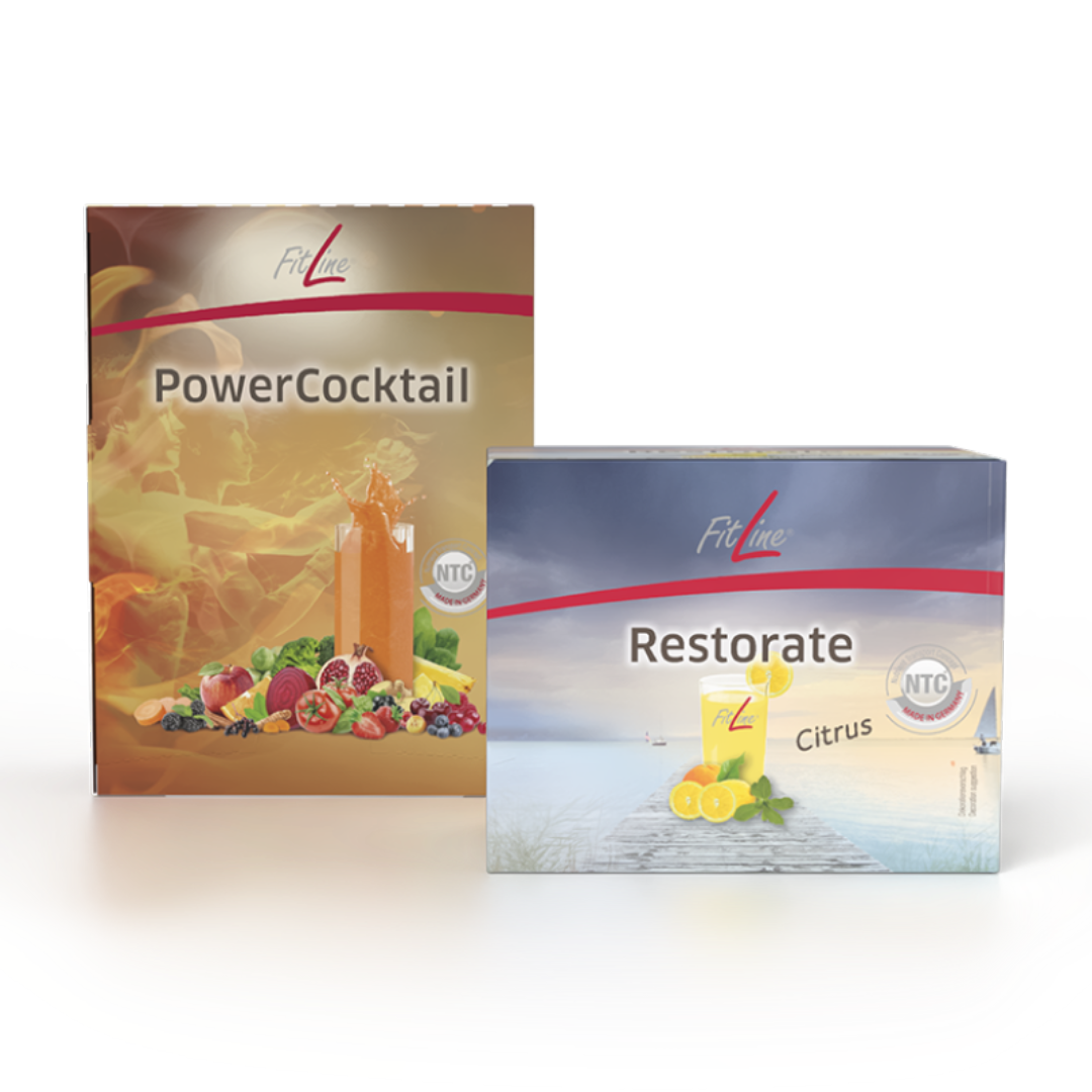 Two boxes of dietary supplement products, one labeled 'PowerCocktail' with fruits and vegetables on the cover, and the other labeled 'Restore' with lemons and a citrus drink on a dock by the water.