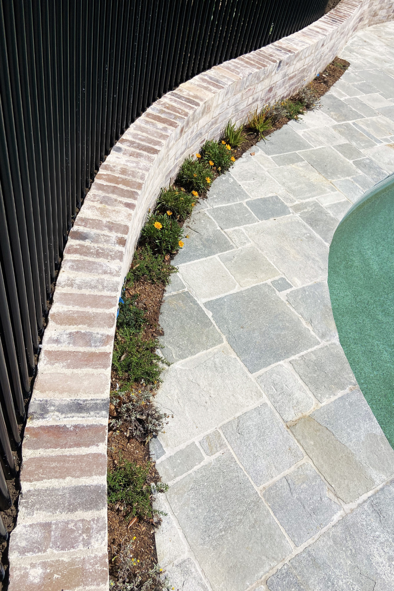 Recycled brick edging and paving