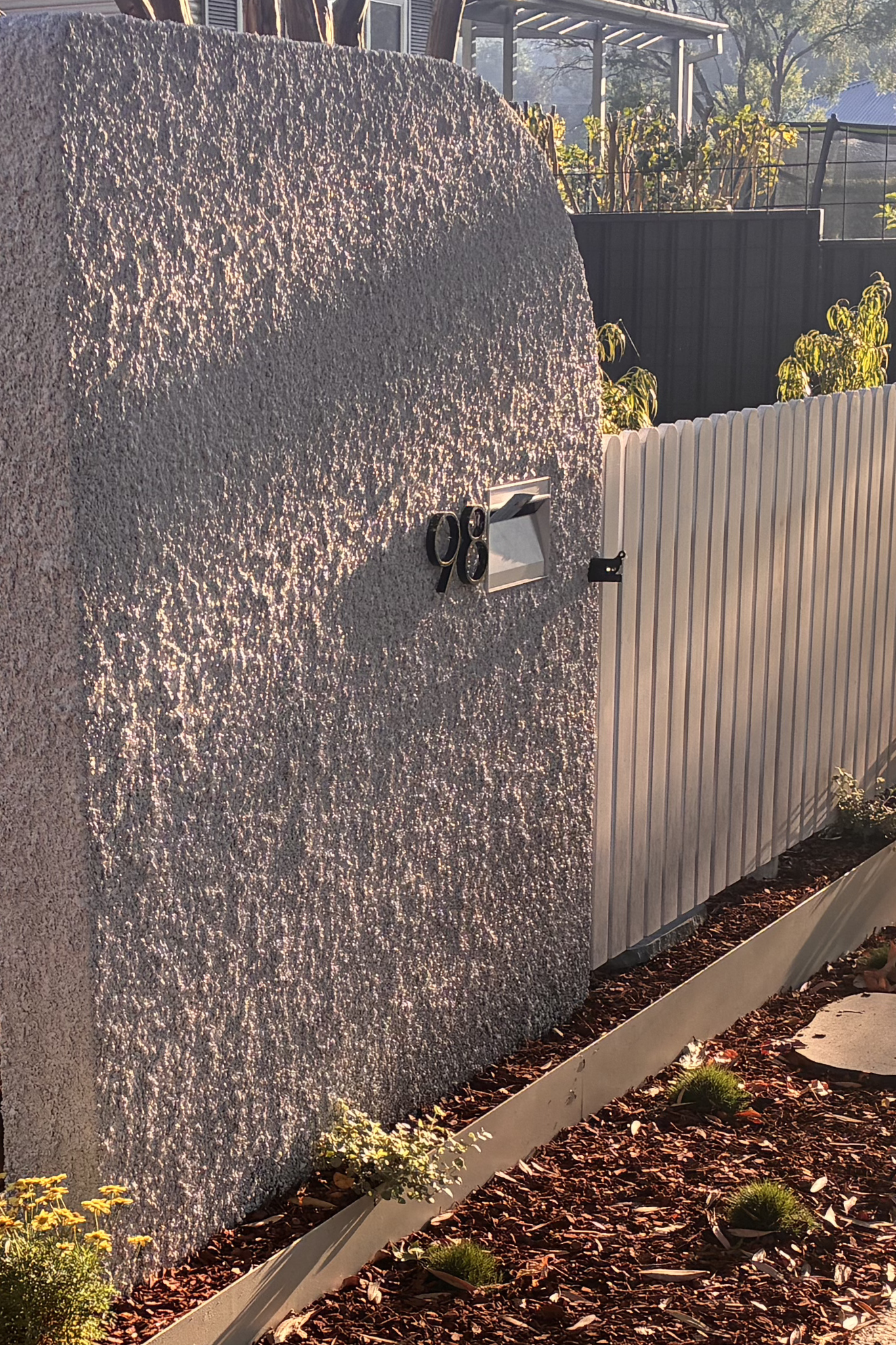 Mail box, popcorn render, white fence, stepper