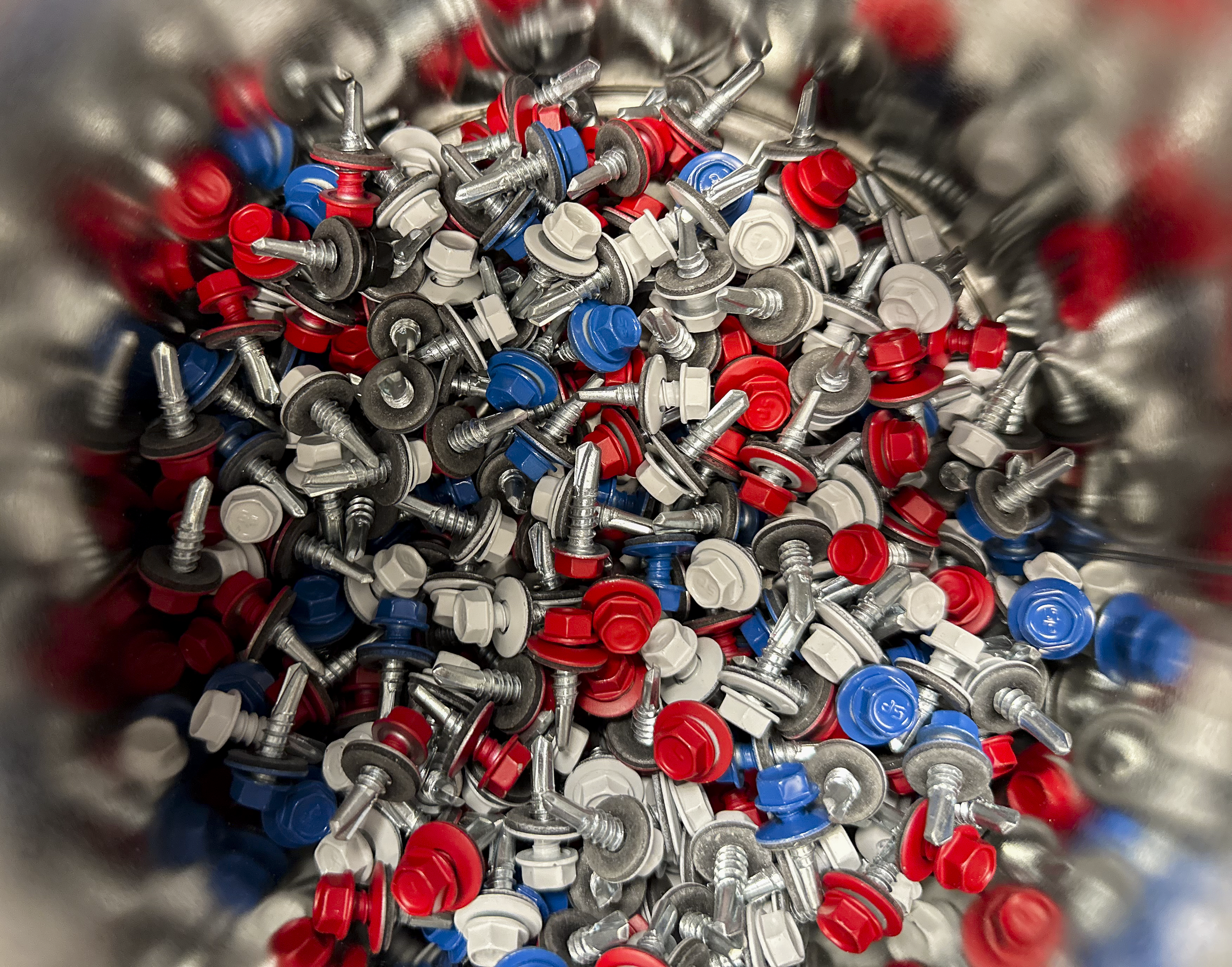 red, white, and blue spray painted screws with neo washers