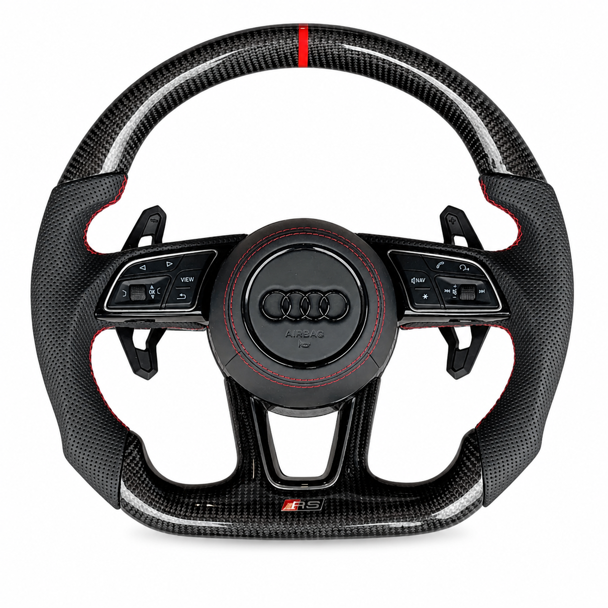 A racing-style car steering wheel with Audi logo, carbon fiber accents, black textured grips, and red stitching, featuring control buttons on either side.