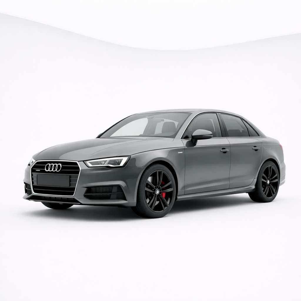 A gray four-door sedan with black rims and red brake calipers in a white studio setting.