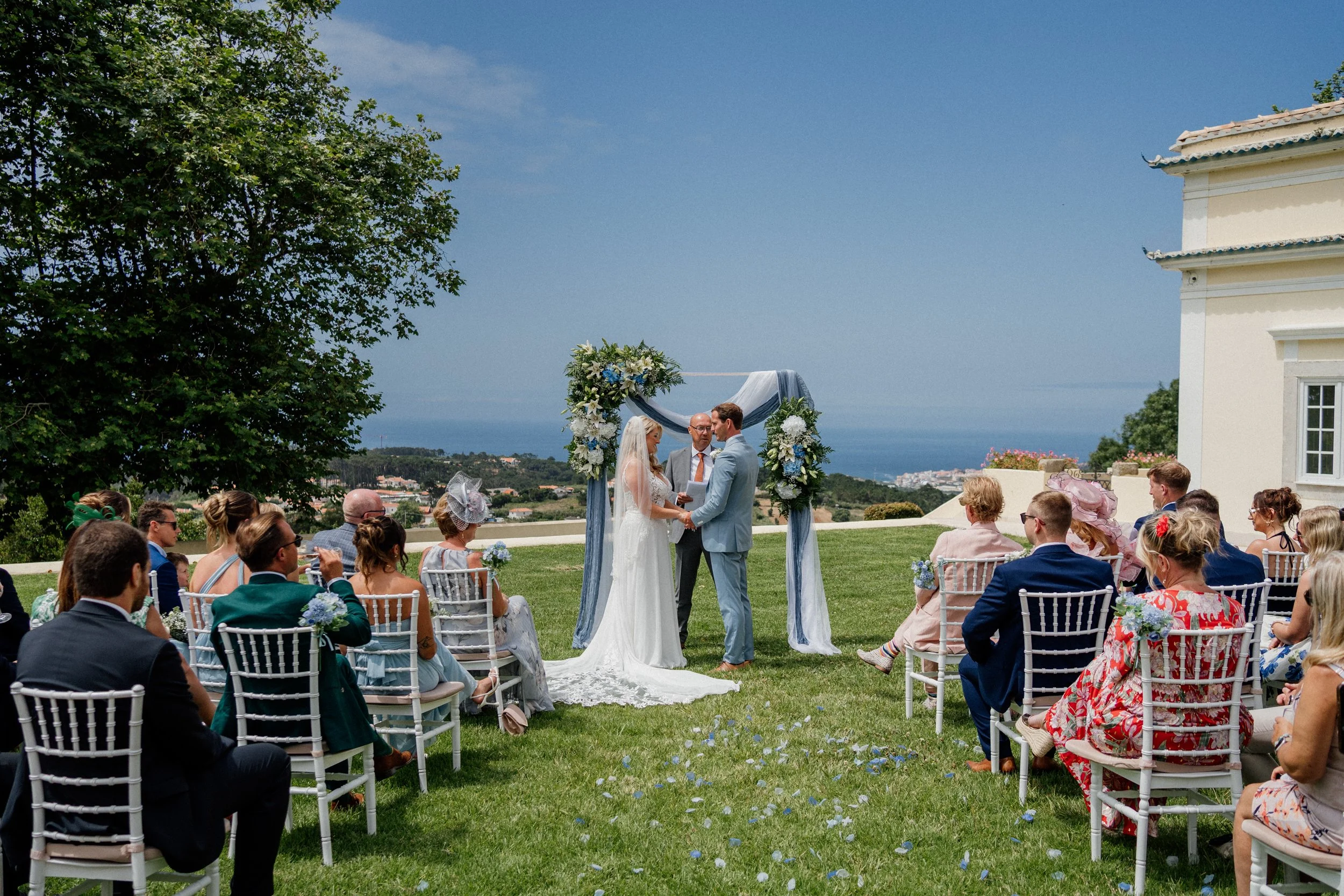 Outdoor wedding ceremony in Portugal surrounded by nature and emotional guests