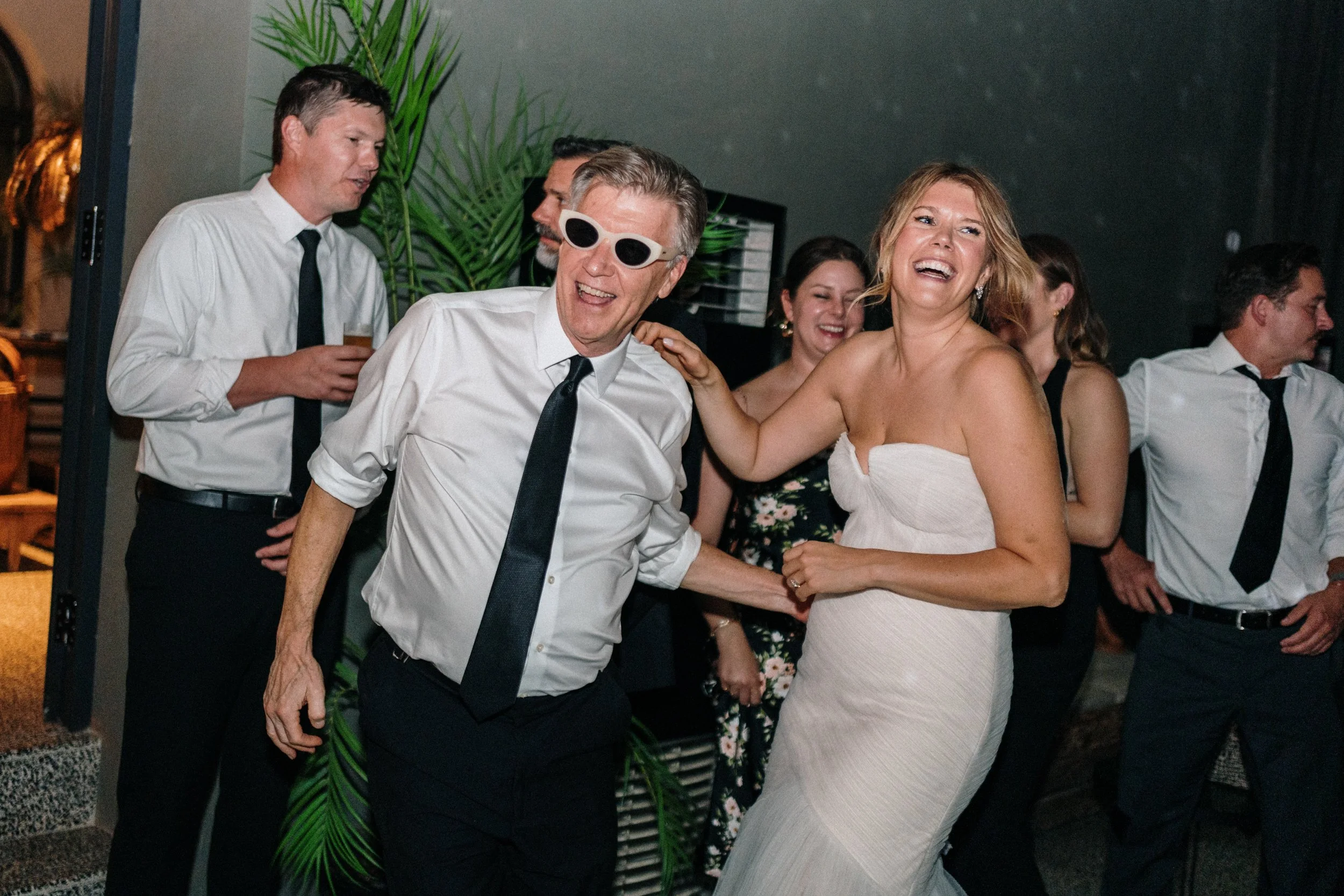 Fun and energetic wedding reception in Portugal with guests dancing and celebrating on the dance floor