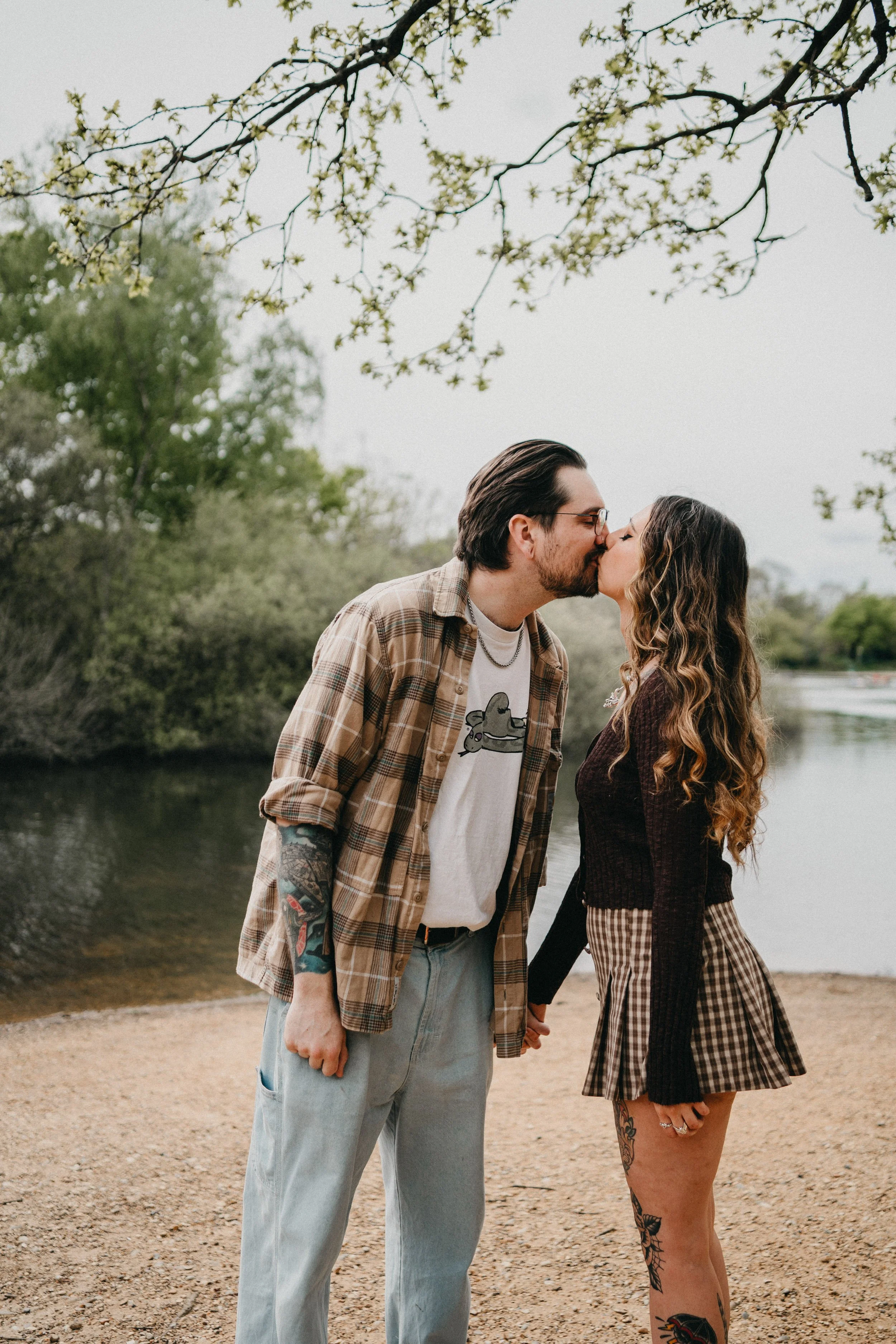 Engagement photography in London, couple posing outdoors romantically.