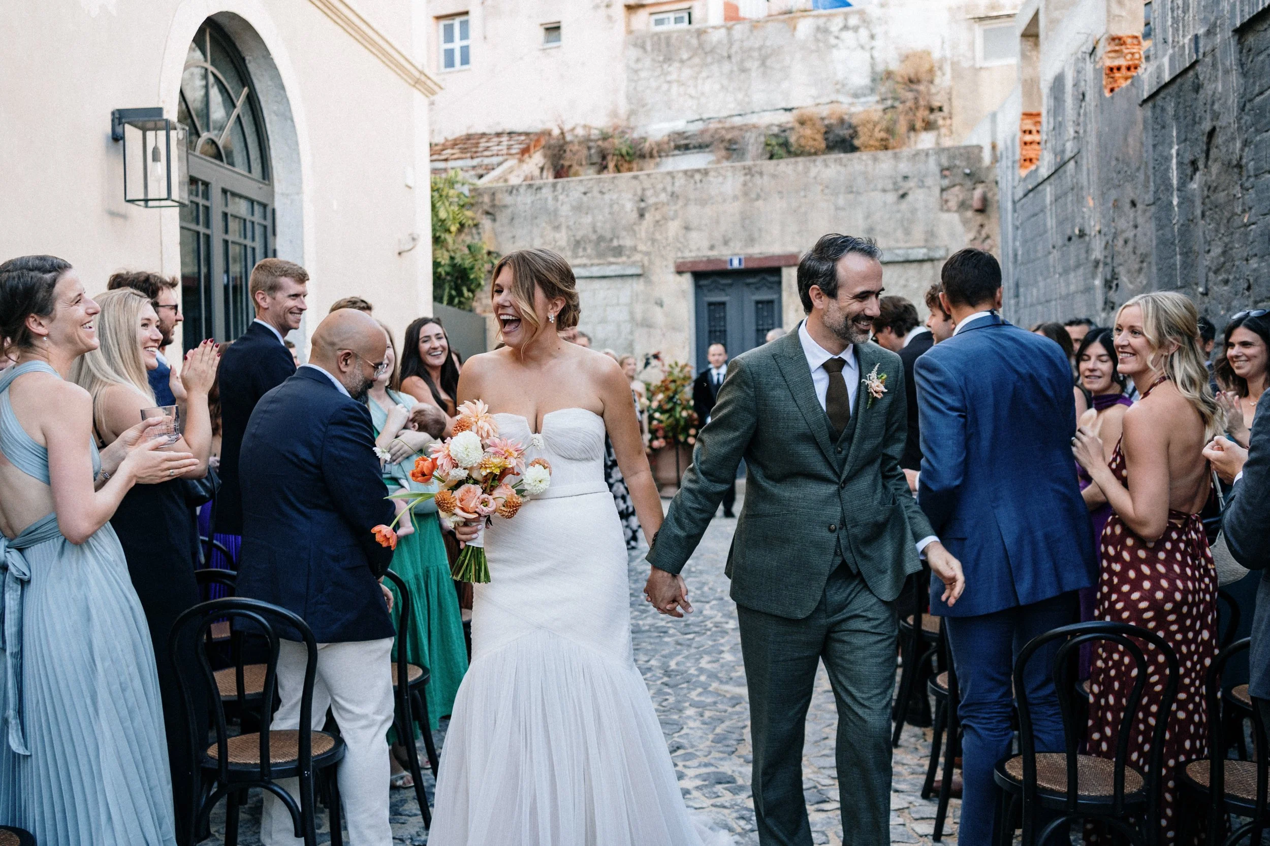 Emotional wedding ceremony moment with bride and groom exchanging vows outdoors