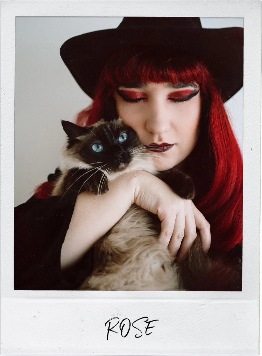 Rose from Wandersoul Stories holding her cat in a moody portrait – Portugal wedding and elopement photographer inspired by storytelling and emotion.