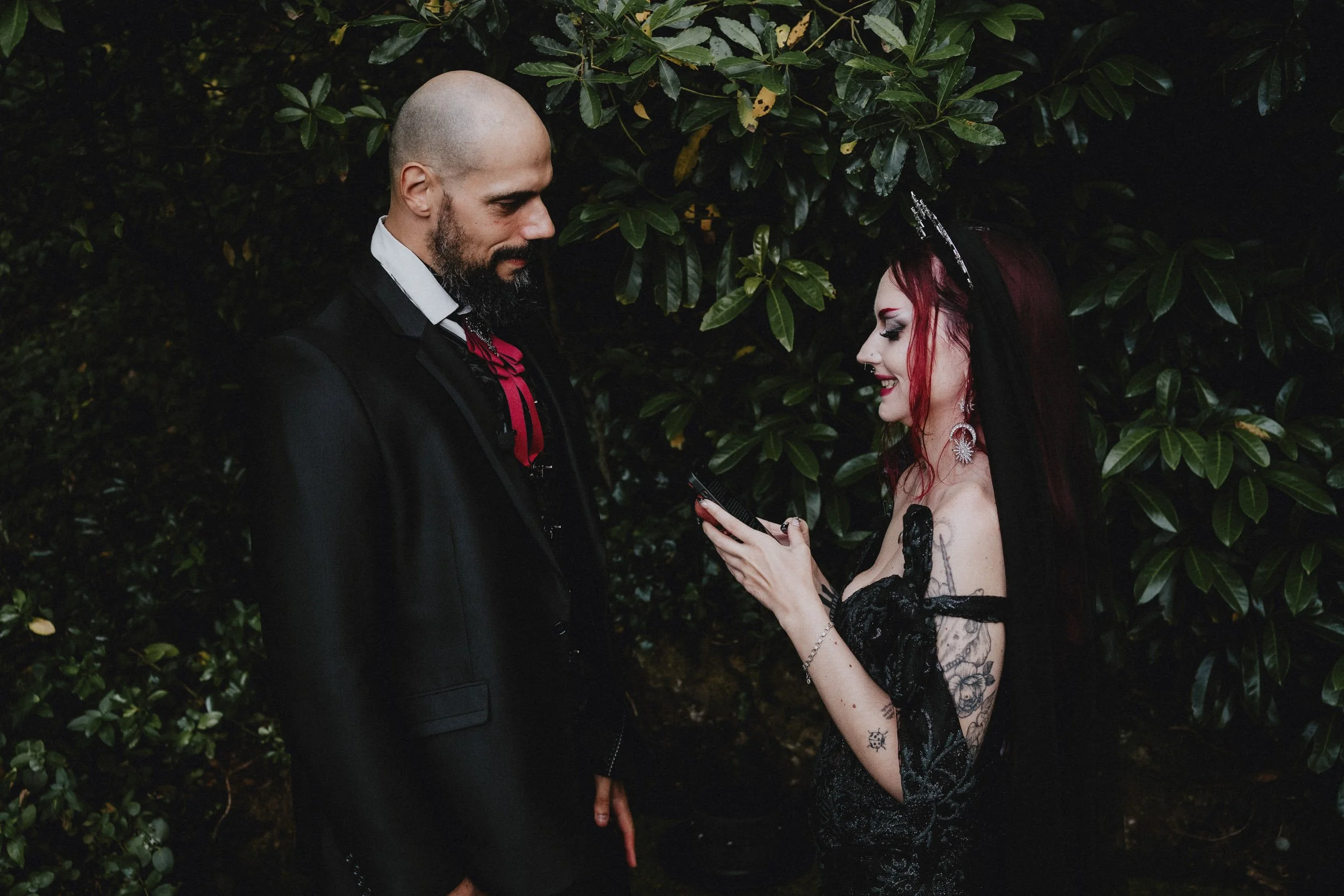Couple exchanging vows during romantic forest elopement in Portugal