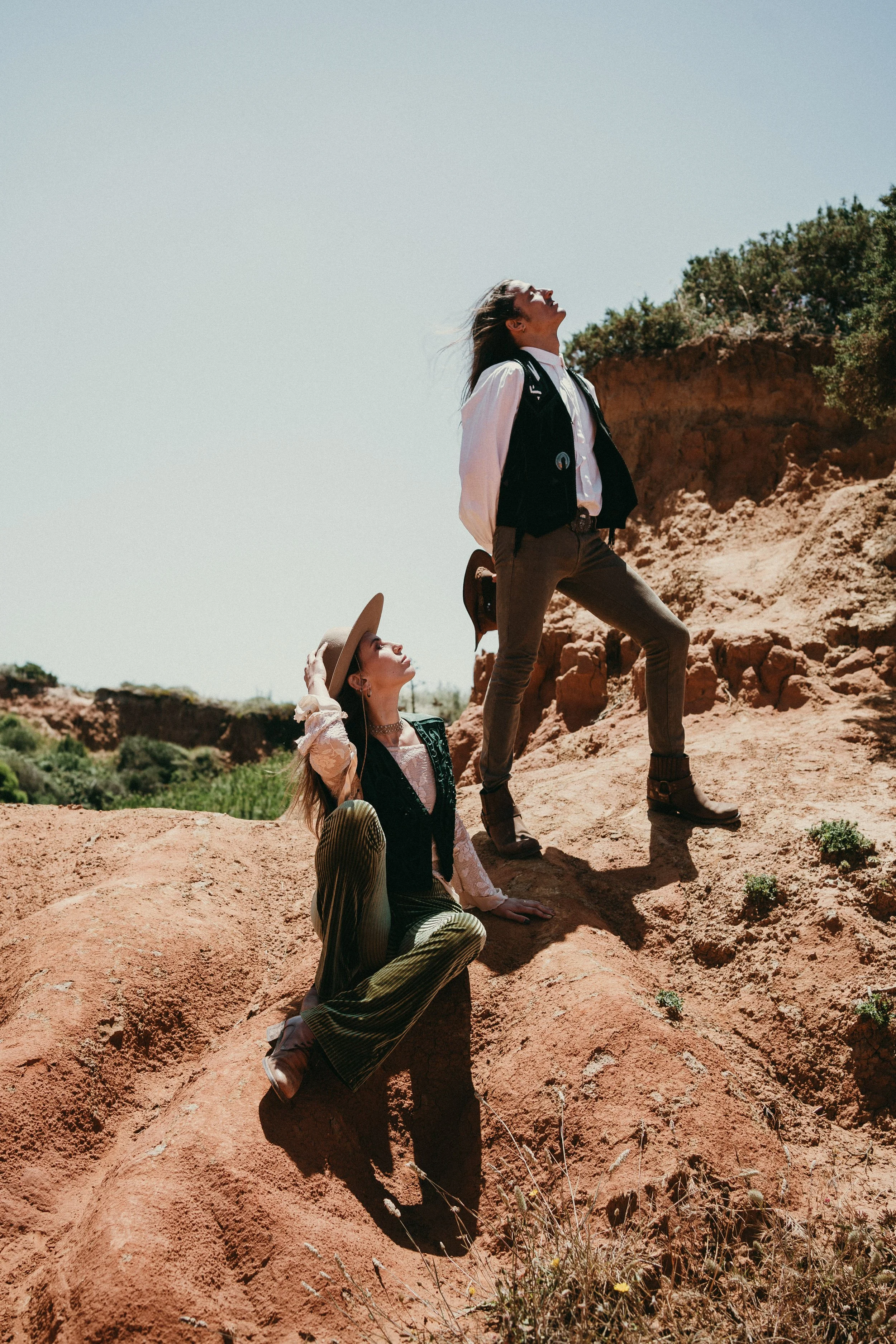 Epic coastal landscape elopement in Portugal with couple overlooking cliffs