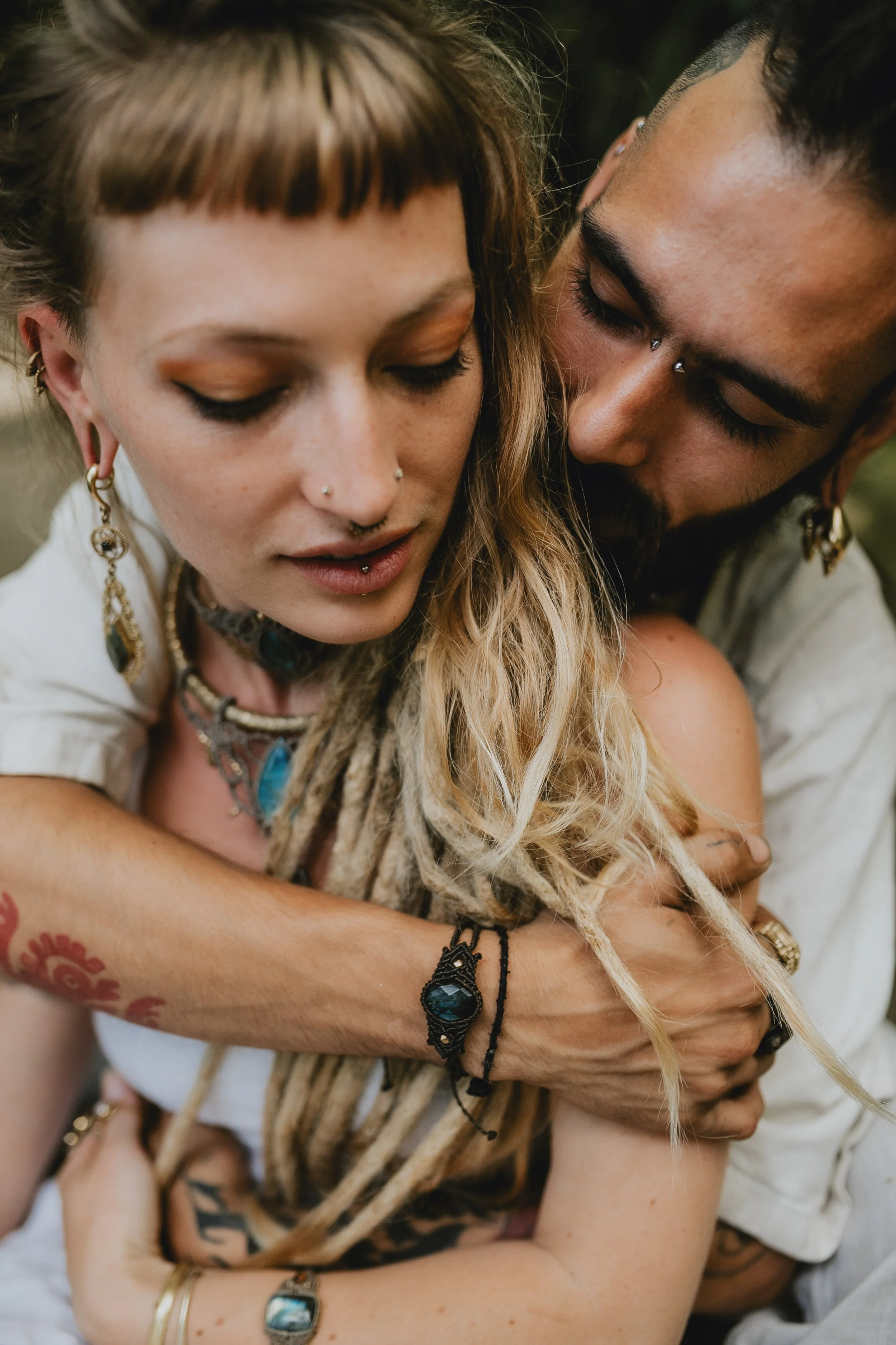 Romantic engagement photography in Portugal, close-up portrait of couple in intimate embrace.