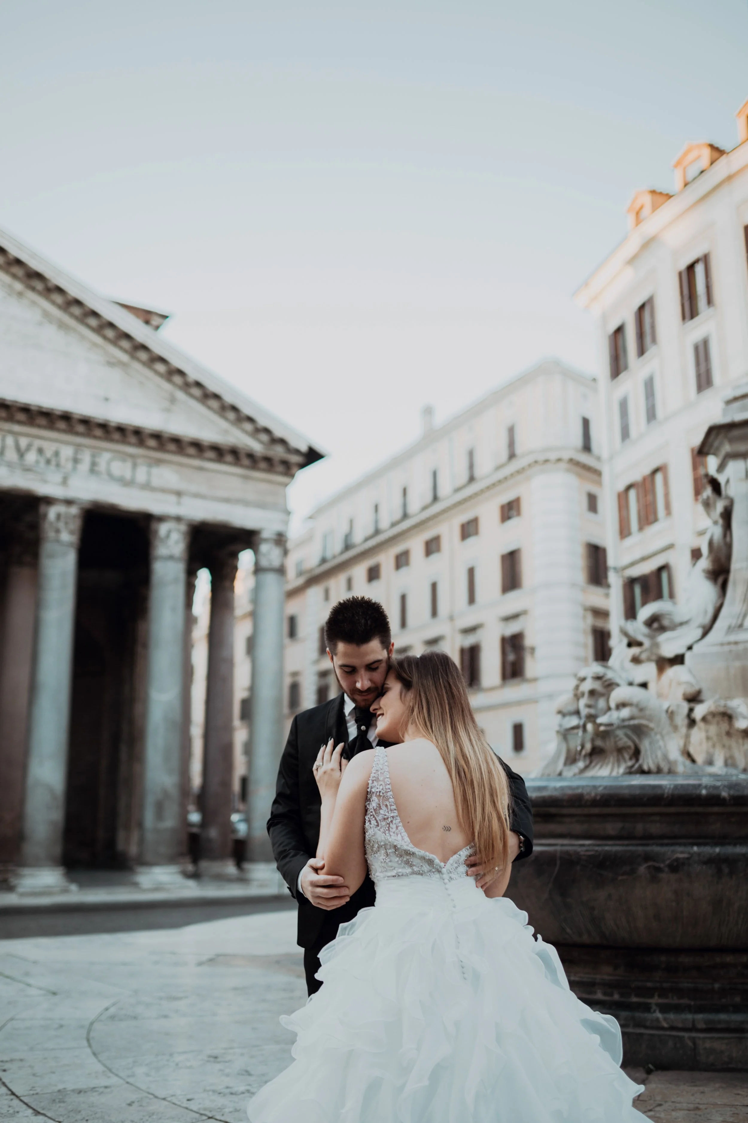 Wedding couple embracing near the Pantheon in Rome during destination elopement