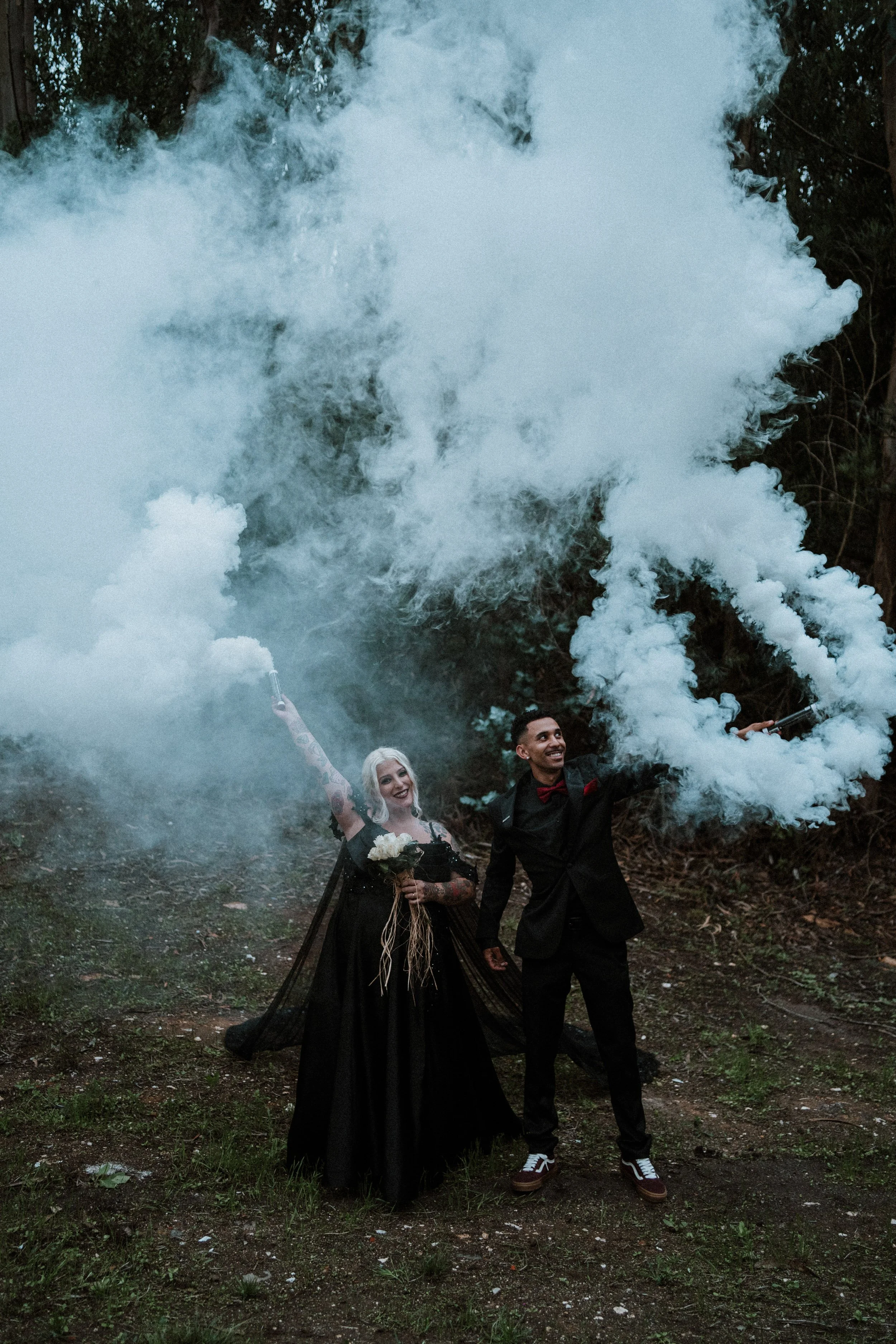 Creative wedding portrait with green smoke bomb during alternative outdoor wedding in Portugal