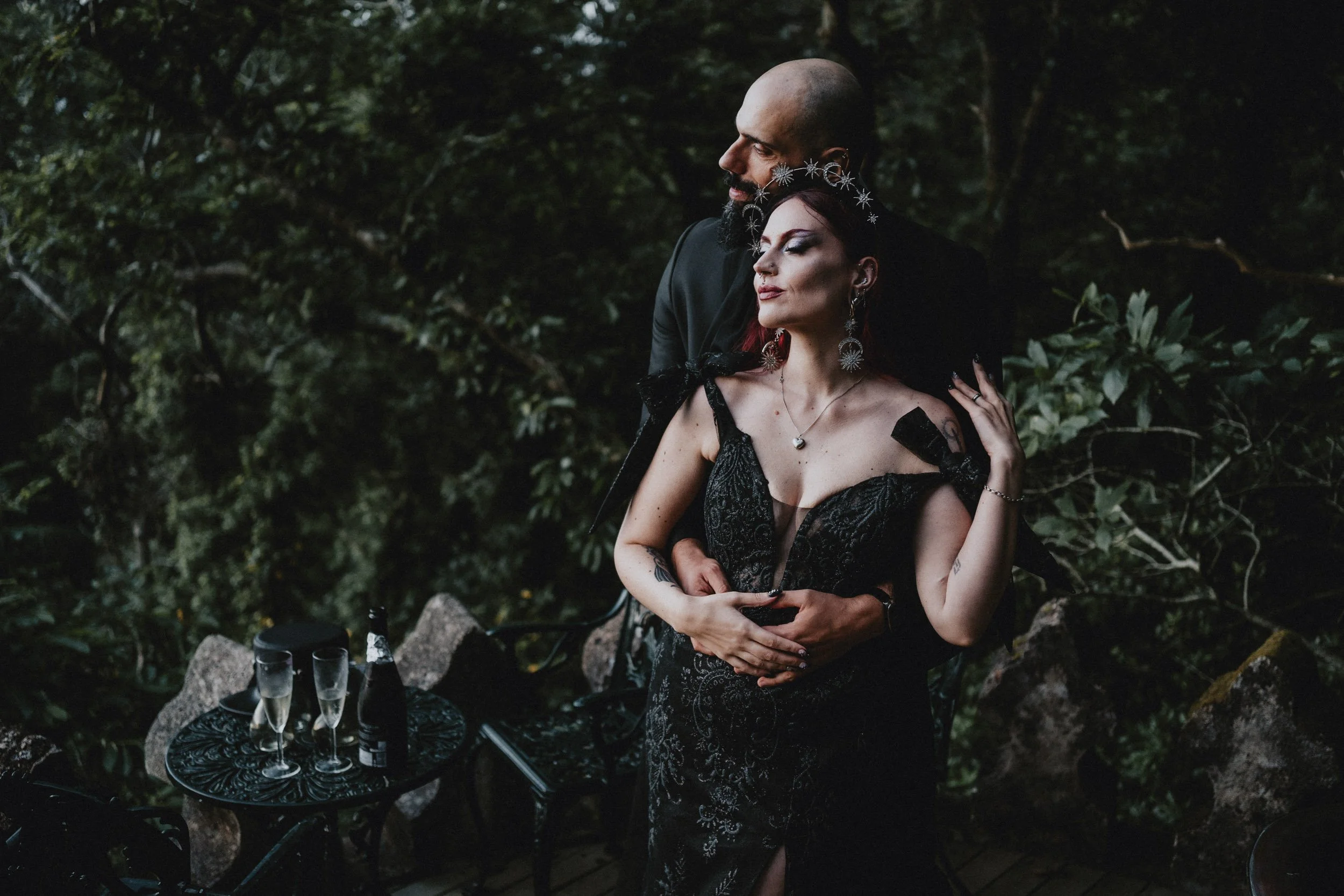 Romantic embrace during forest elopement in Portugal