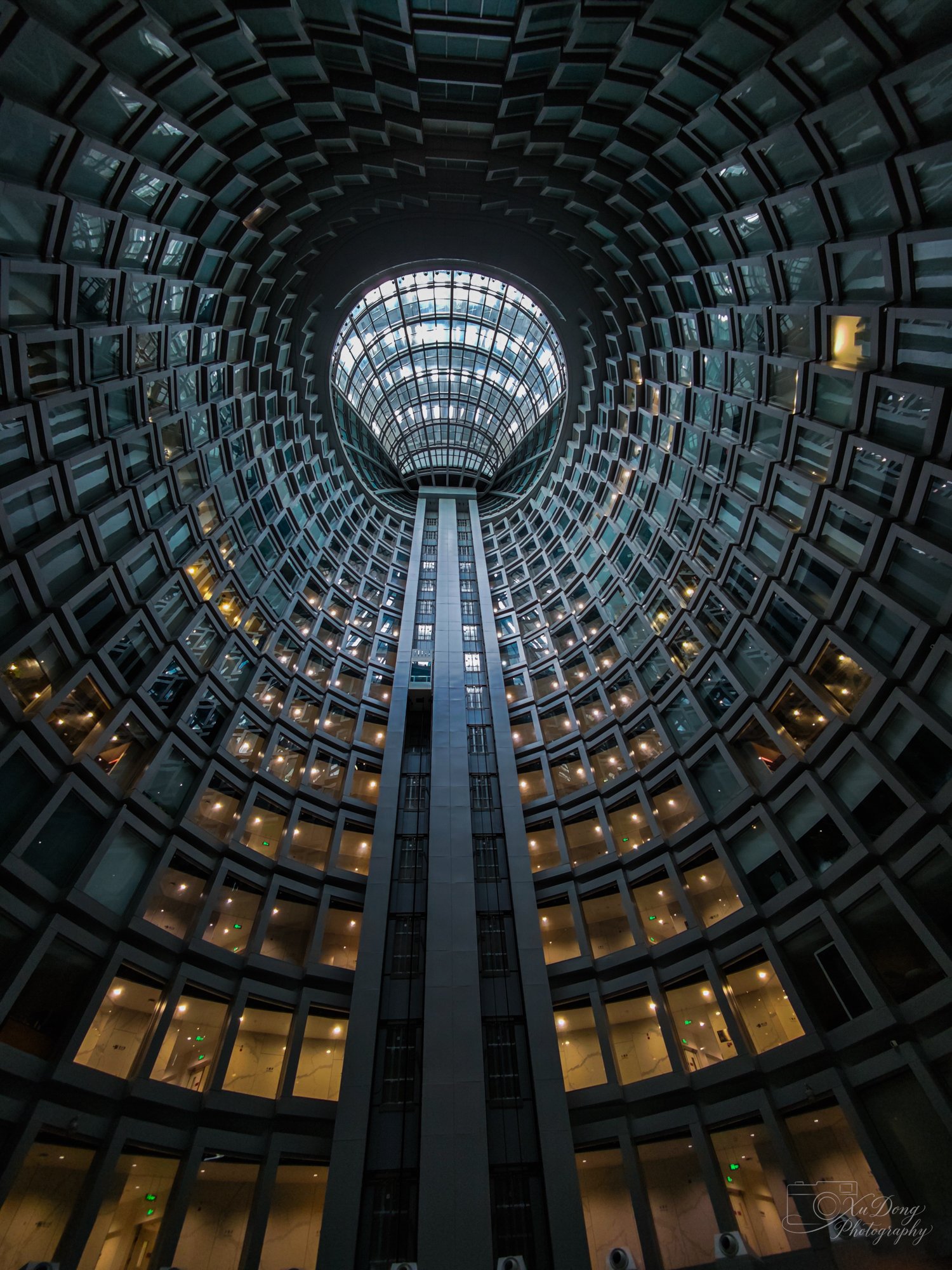 A geometric deep dive into the grand hall of Beijing’s Cheng'ao Building, emphasizing monumental scale and modern lines