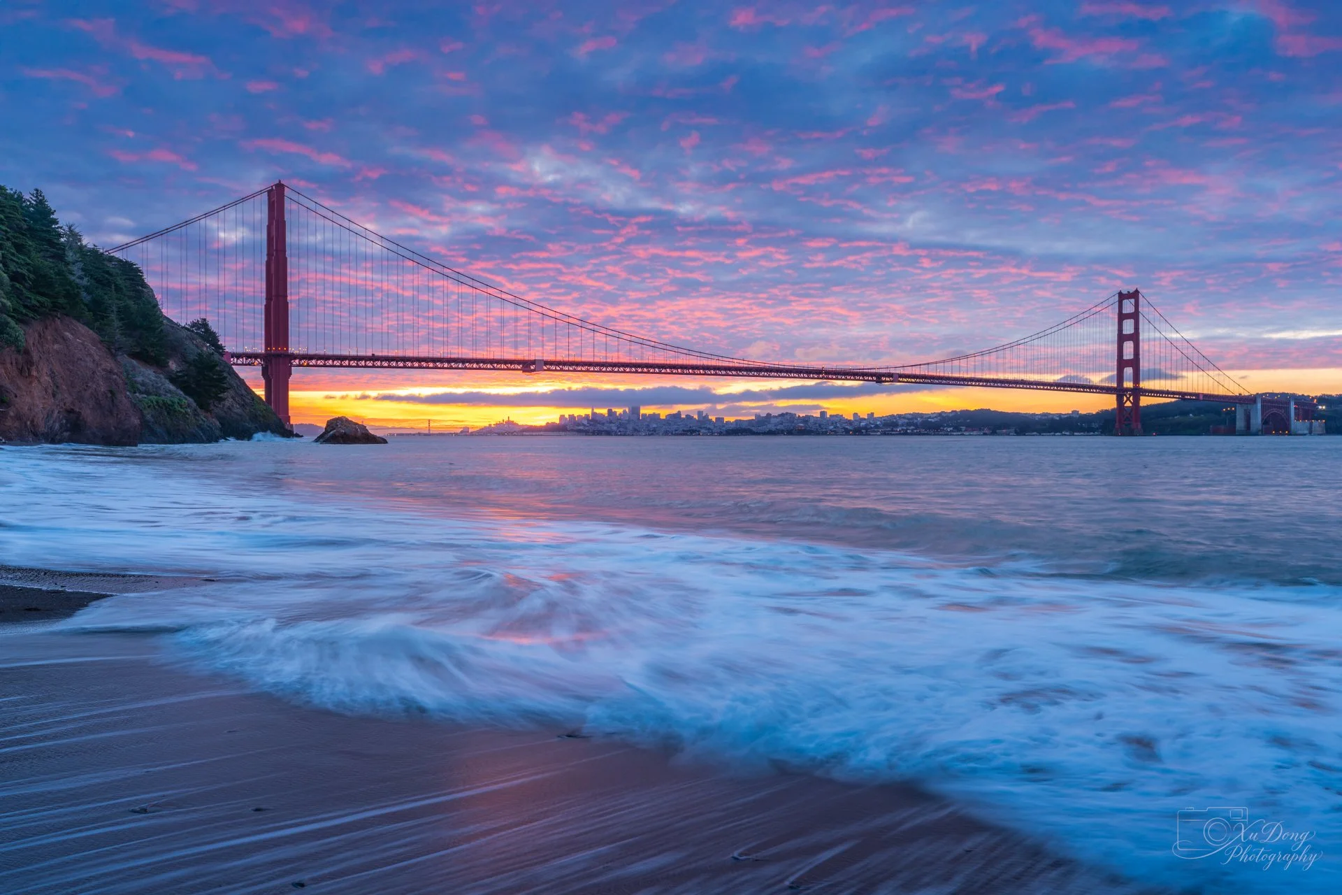 Golden Gate Bridge framed by coastal waves