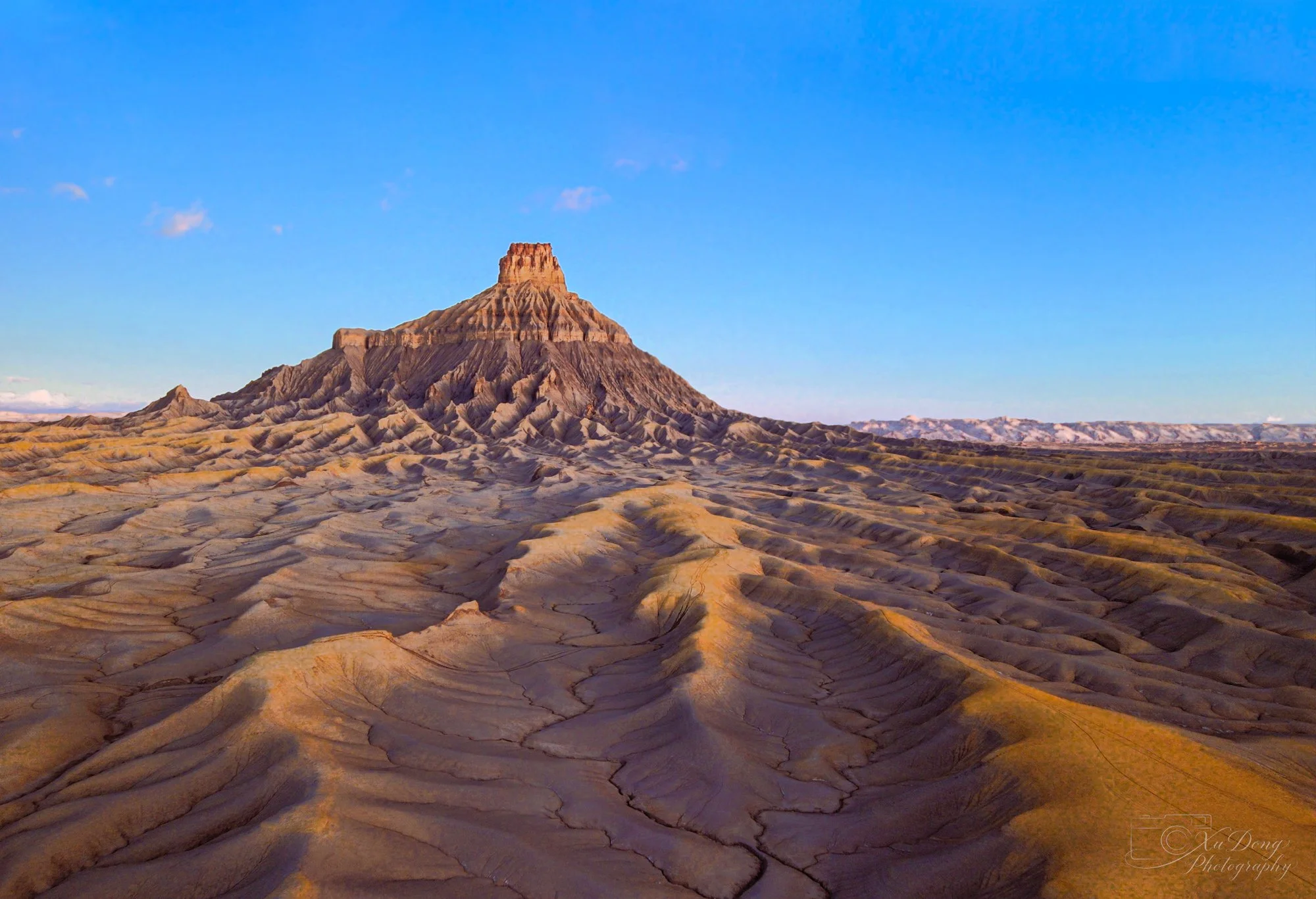 Fine art landscape photography of Factory Butte in the Utah Badlands at sunrise