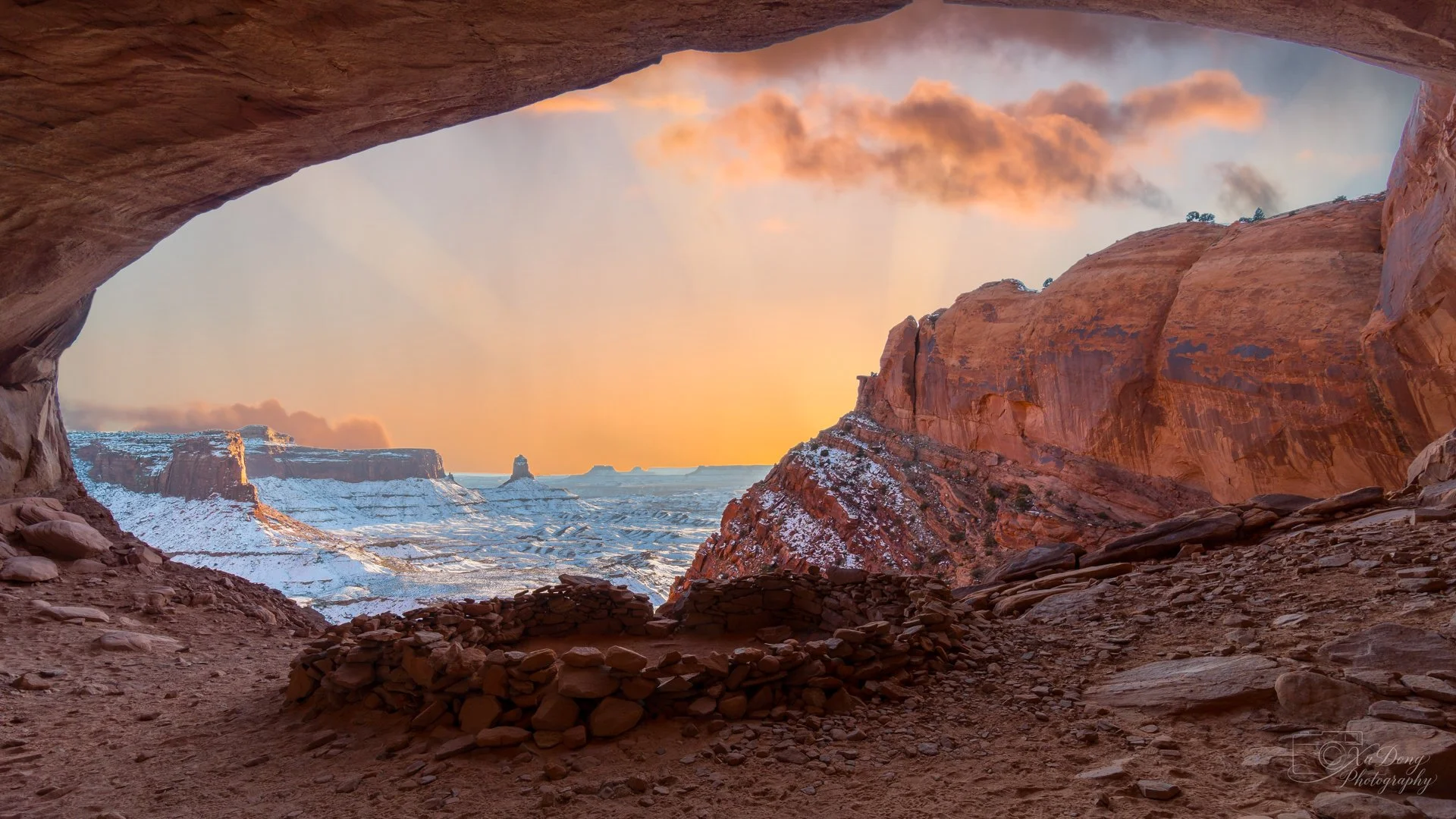 Historical 2017 capture of the False Kiva stone circle framing Candlestick Tower in Canyonlands national Park