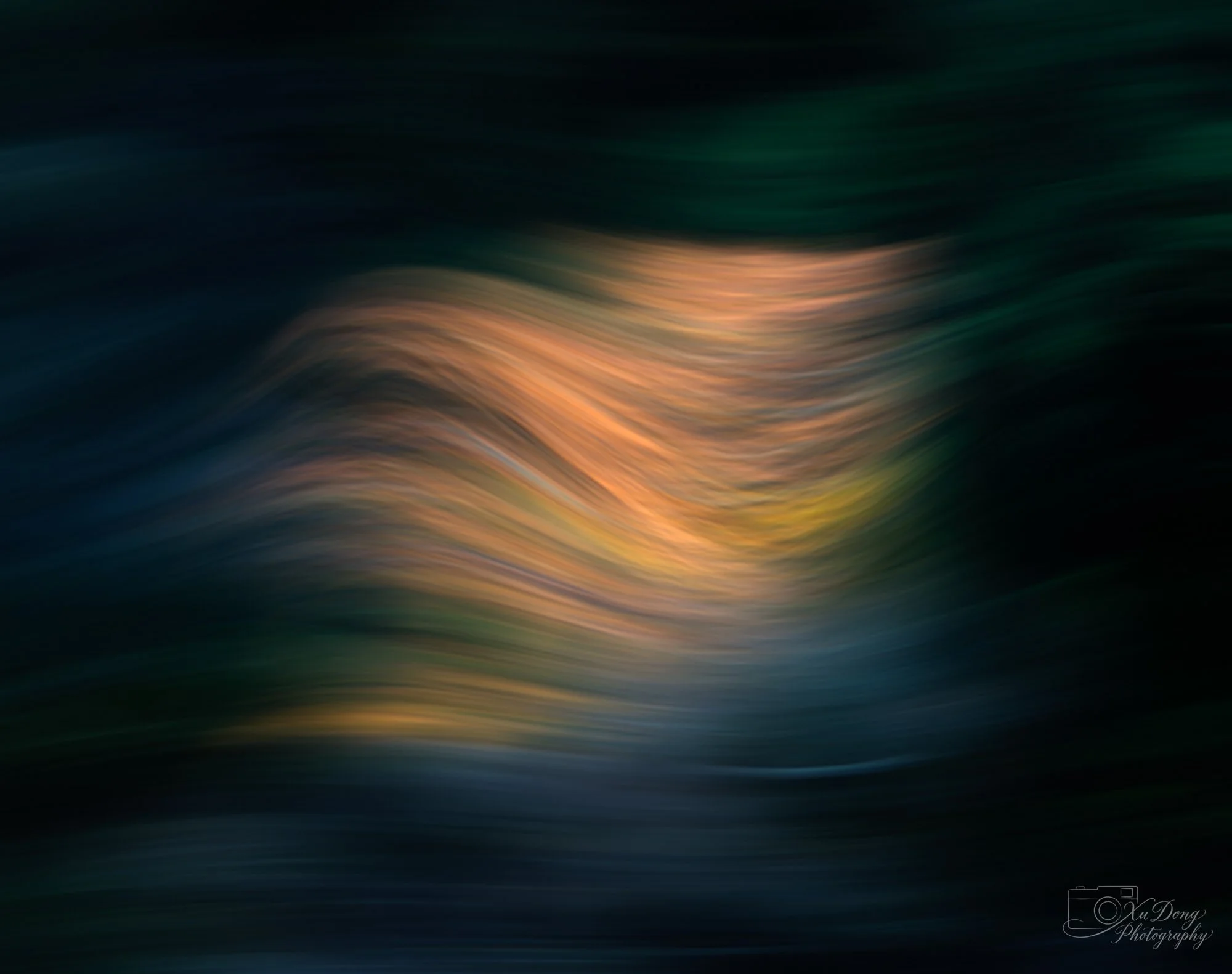 Atmospheric photography depicting the quiet, fluid movement of water at dusk.