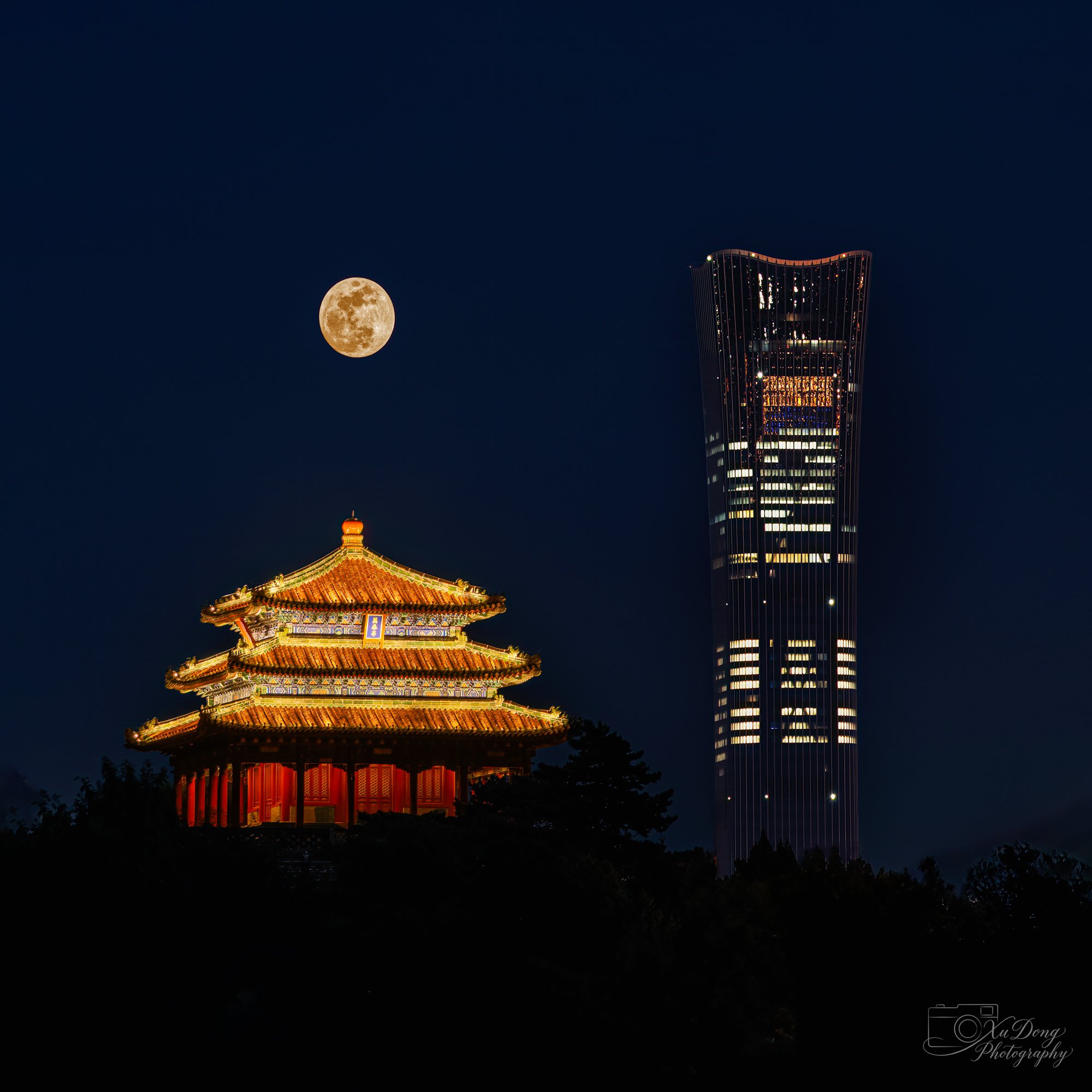 A breathtaking supermoon rising behind a traditional Chinese pagoda, framed against the futuristic China Zun skyscraper.