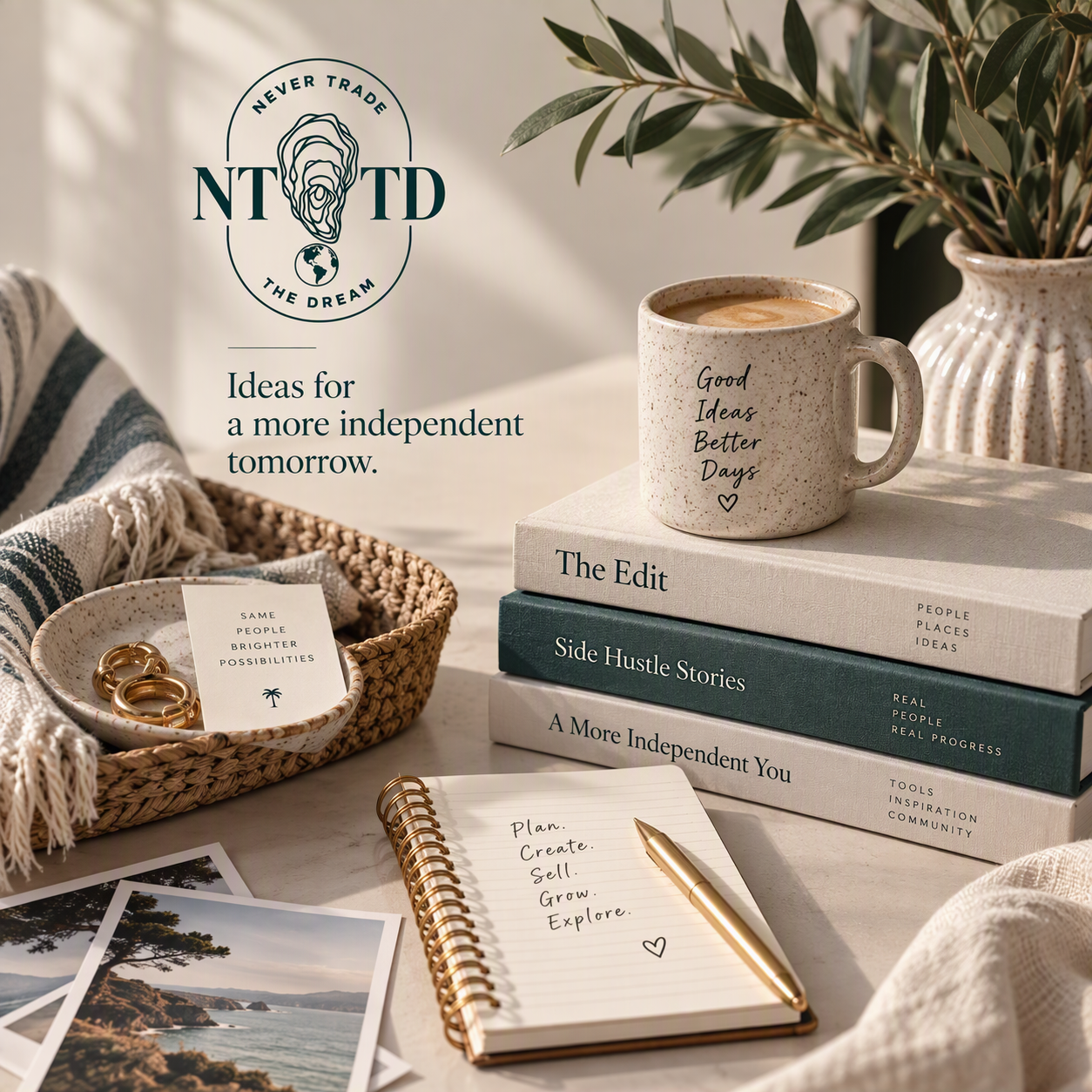 Cozy workspace still life with coffee mug, inspirational books, notebook and pen, woven basket, jewelry dish, olive plant, and motivational branding.